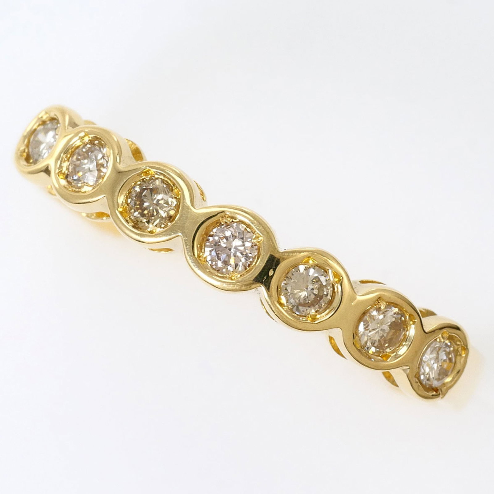 Band Ring Yellow Gold (18K): Band Ring Yellow Gold (18K) Yellow gold band ring with a 0.20ct diamond, crafted from 18K gold, offers a touch of elegance with its slender 3mm width and US size 6.5 fit. Made from high-quality