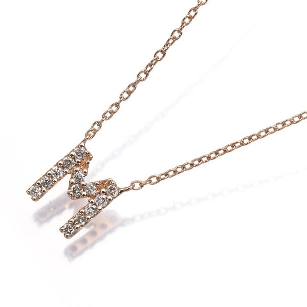 Folli Follie Necklace Diamond 0.09Ct Initial M 10K 416 Rose Gold: Folli Follie Necklace Diamond 0.09Ct Initial M 10K 416 Rose Gold Folli Follie's 10k rose gold necklace features a stunning 0.09ct diamond pendant, carefully crafted into an initial "M" design. The