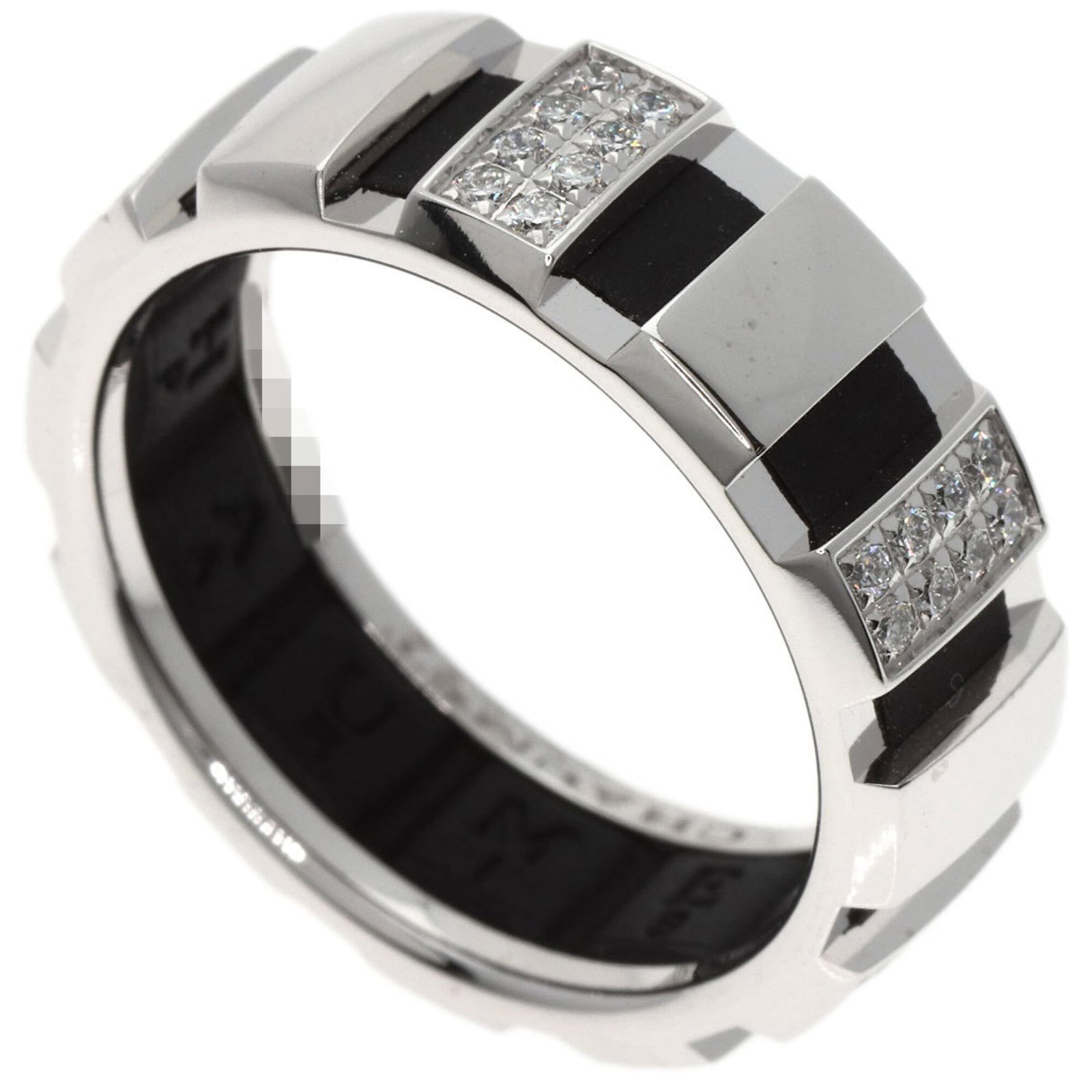 CHAUMET Band Ring White Gold (18K): CHAUMET Band Ring White Gold (18K) Chaumet's 18K white gold band ring boasts a sleek design, featuring a diamond stone. This like-new used ring is in excellent condition, with only the faintest