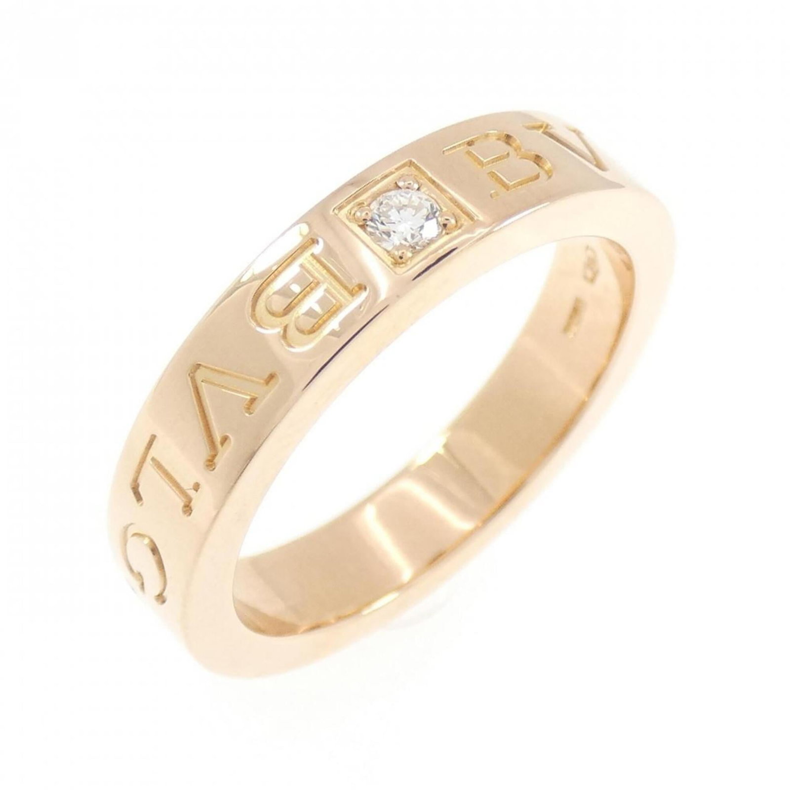 BVLGARI Band Ring Pink Gold (18K): BVLGARI Band Ring Pink Gold (18K) Pink gold (18K) band ring from Bvlgari, featuring a diamond stone, and available in US size 6. This like new used ring boasts excellent condition with no visible