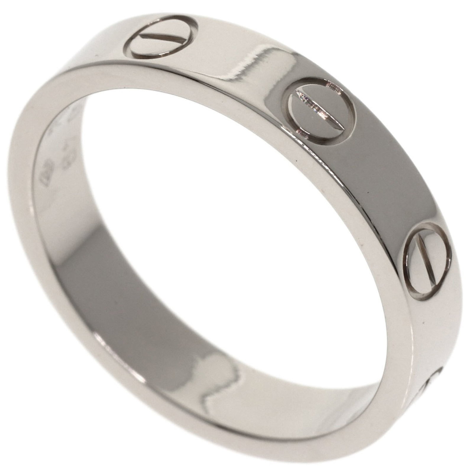 CARTIER Band Ring White Gold (18K): CARTIER Band Ring White Gold (18K) Cartier Band Ring White Gold (18K) is a gently used, very good condition band ring featuring 18K white gold. The ring bears minor signs of wear, including small