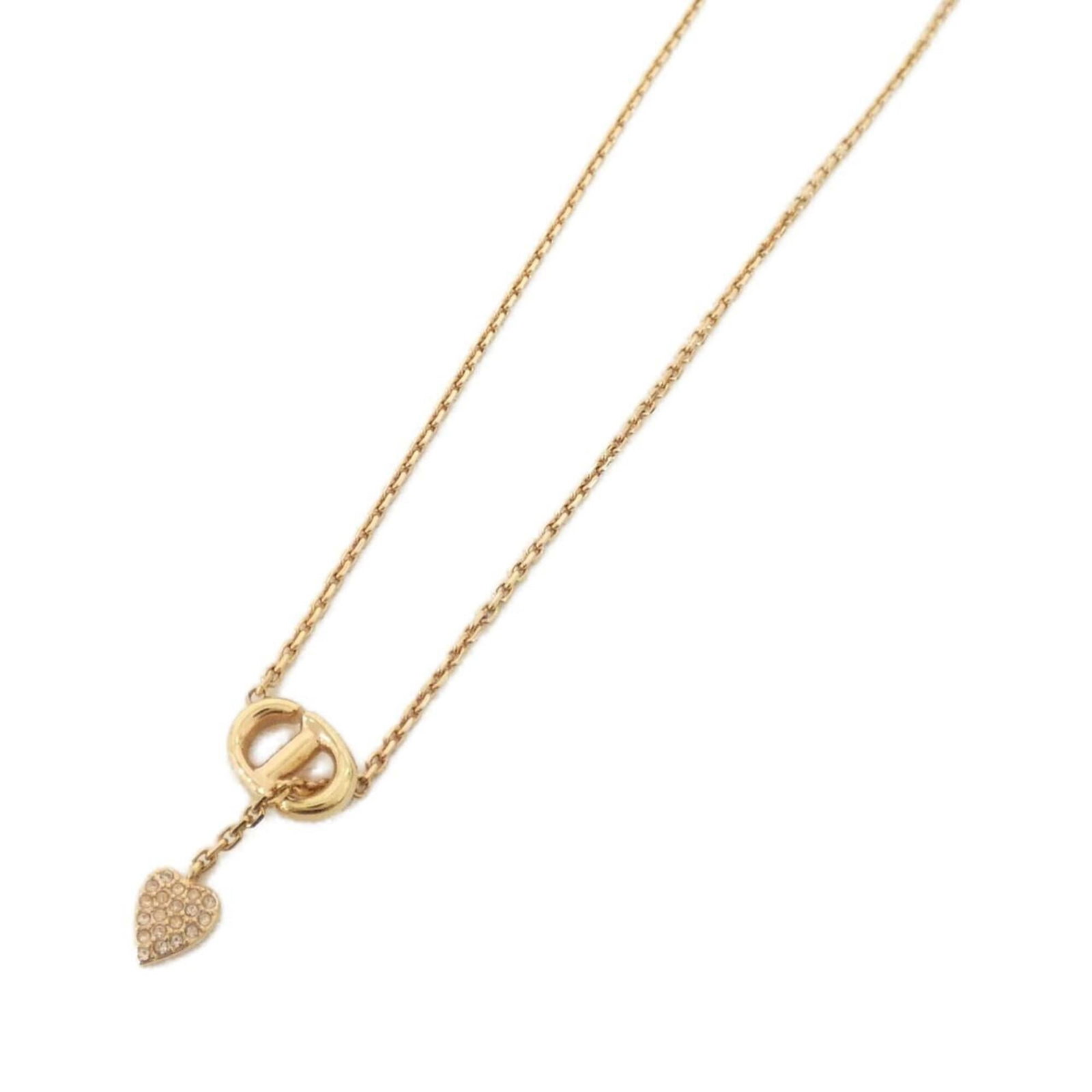 CHRISTIAN DIOR Clear Pink Gold: CHRISTIAN DIOR Clear Pink Gold Clear Pink Gold Necklace from Christian Dior, featuring a 23mm x 13mm pendant in a delicate design, suspended from a chain that fits necks 37.5 cm - 42 cm in