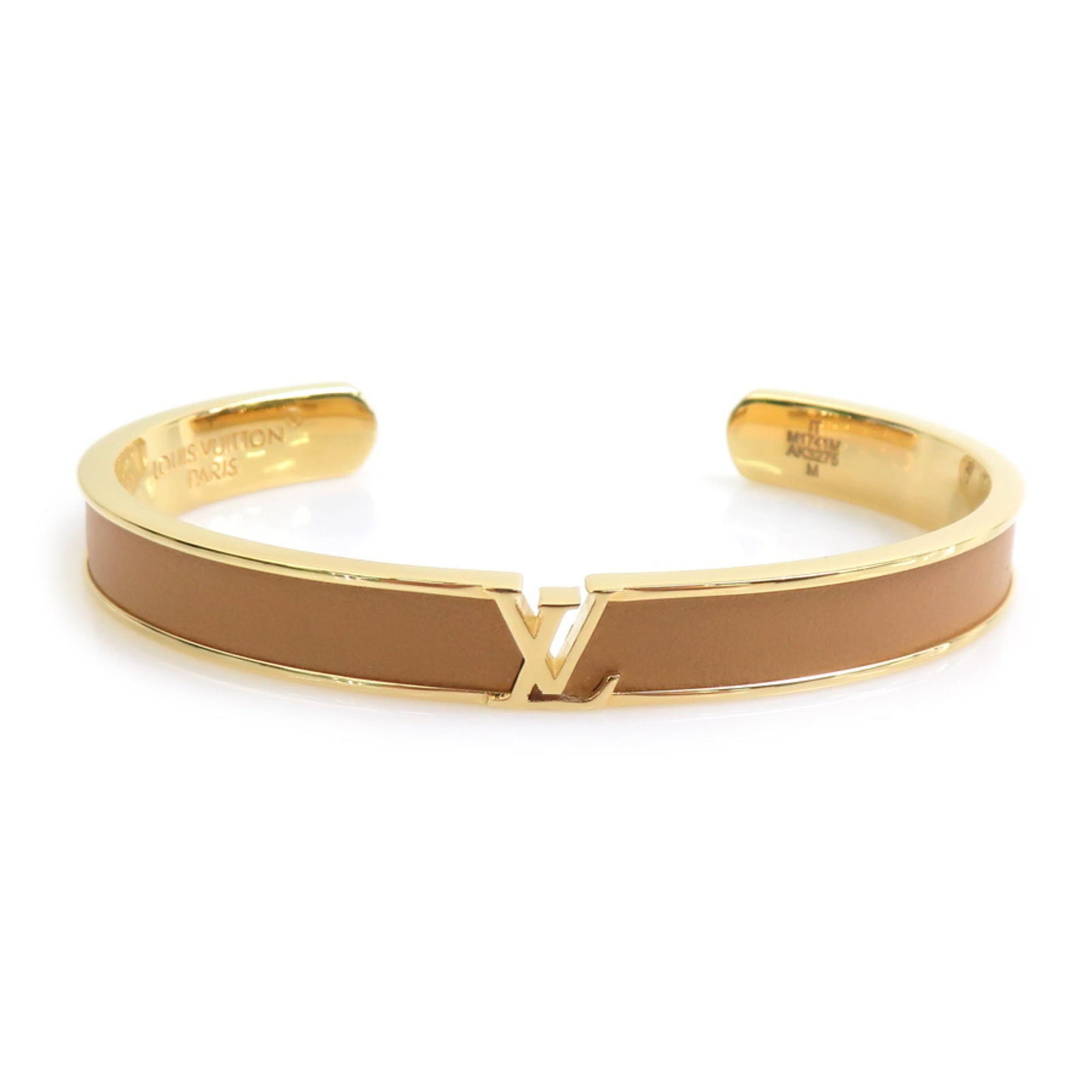 LOUIS VUITTON Bangle Leather Metal: LOUIS VUITTON Bangle Leather Metal This Louis Vuitton bangle features a unique combination of beige leather and gold metal, showcasing the brand's signature style. The item boasts a classic 16cm