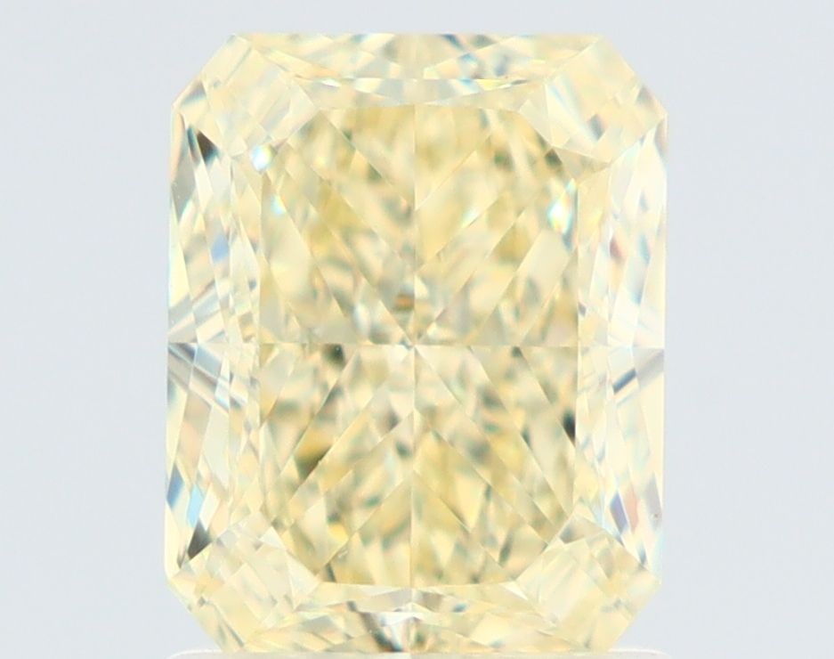 GIA Radiant 1.55ct Fancy Light Yellow VVS2 - Loose Natural Diamond: GIA Radiant 1.55ct Fancy Light Yellow VVS2 - Loose Natural Diamond GIA-certified, this 1.55ct Fancy Light Yellow VVS2 diamond boasts exceptional clarity and polish, with a radiant light yellow color