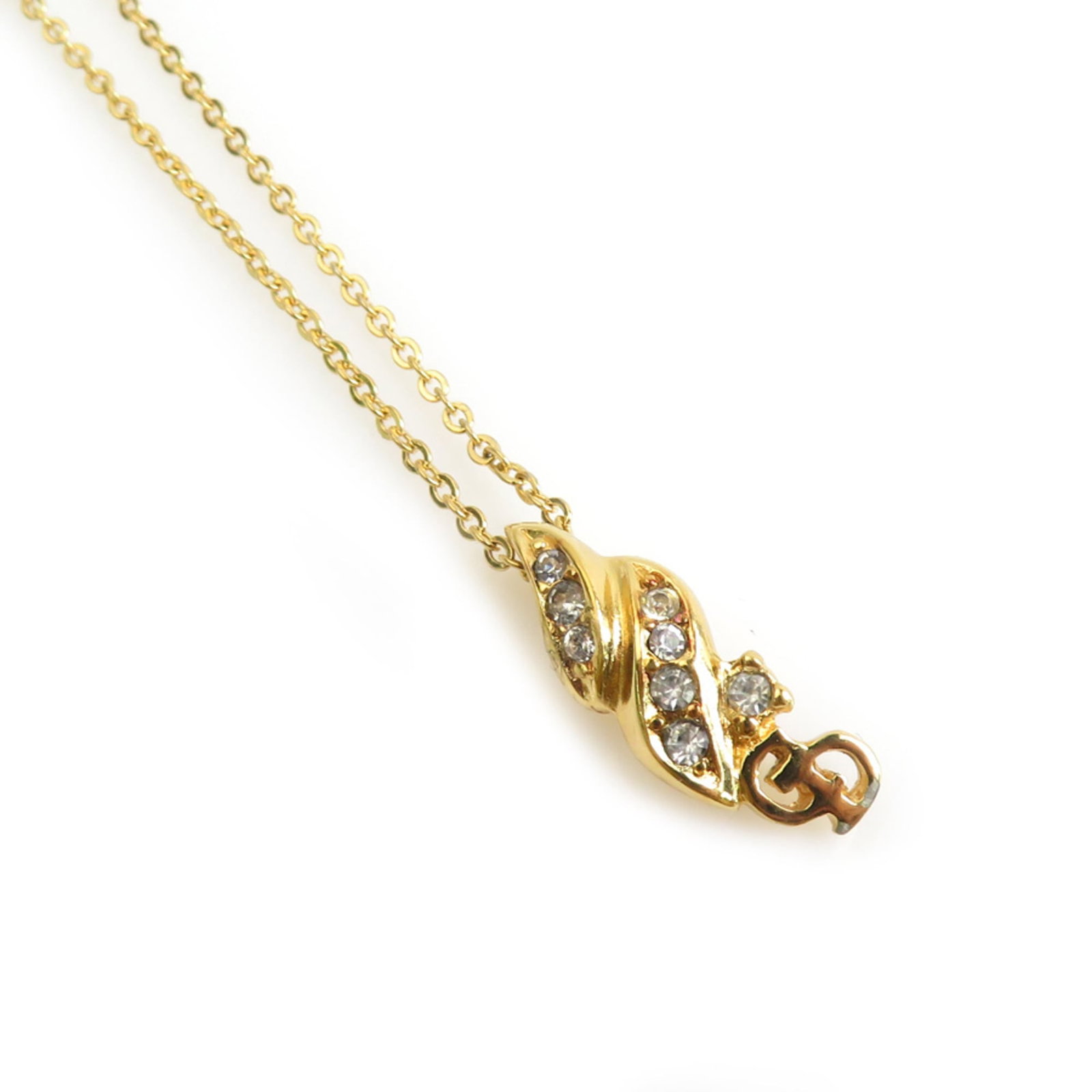 CHRISTIAN DIOR Metal: CHRISTIAN DIOR Metal Gold Metal Christian Dior Necklace with 20mm x 7mm Pendant, 37 cm Circumference. This gold metal Christian Dior necklace features a 20mm x 7mm pendant and has a 37 cm