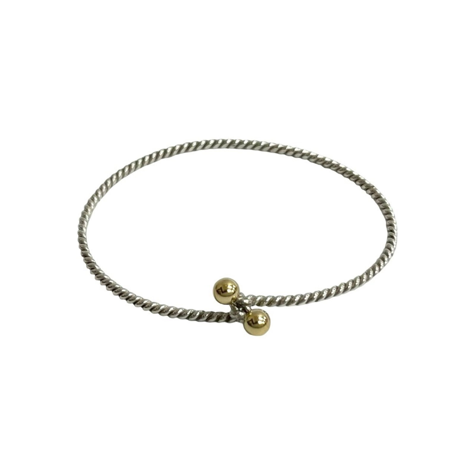TIFFANY Charm Bracelet Gold (18K) Silver 925: TIFFANY Charm Bracelet Gold (18K) Silver 925 Gold (18K) and Silver 925 charm bracelet from Tiffany, featuring a mix of luxurious materials. This 17cm charm bracelet boasts a classic design with