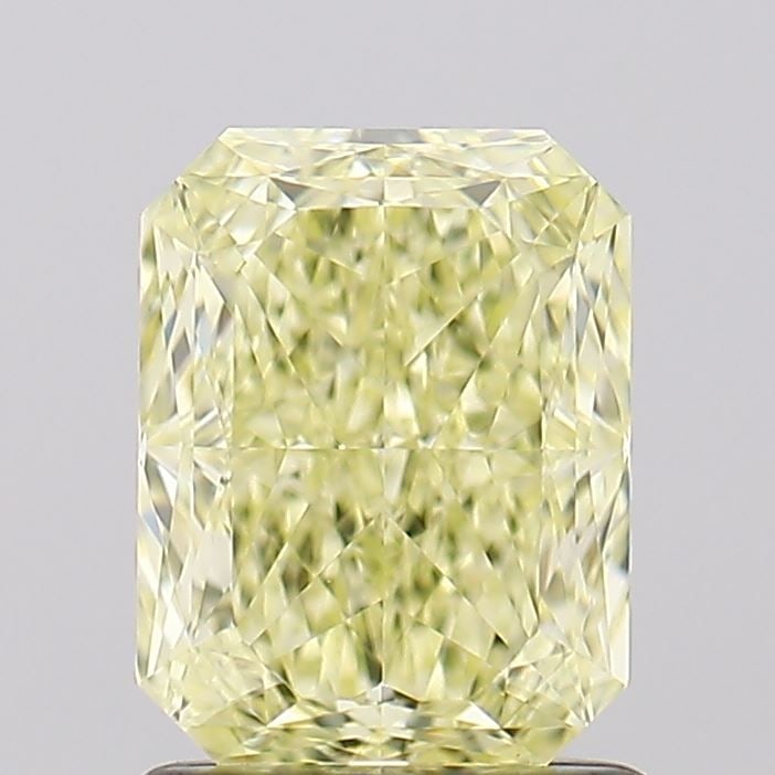 GIA Radiant 1.53ct Fancy Yellow VVS2 - Loose Natural Diamond: GIA Radiant 1.53ct Fancy Yellow VVS2 - Loose Natural Diamond GIA certified 1.53ct Fancy Yellow VVS2 diamond, showcasing exceptional clarity and a vibrant yellow hue. Measuring 7.23L x 5.54W x 3.84H,