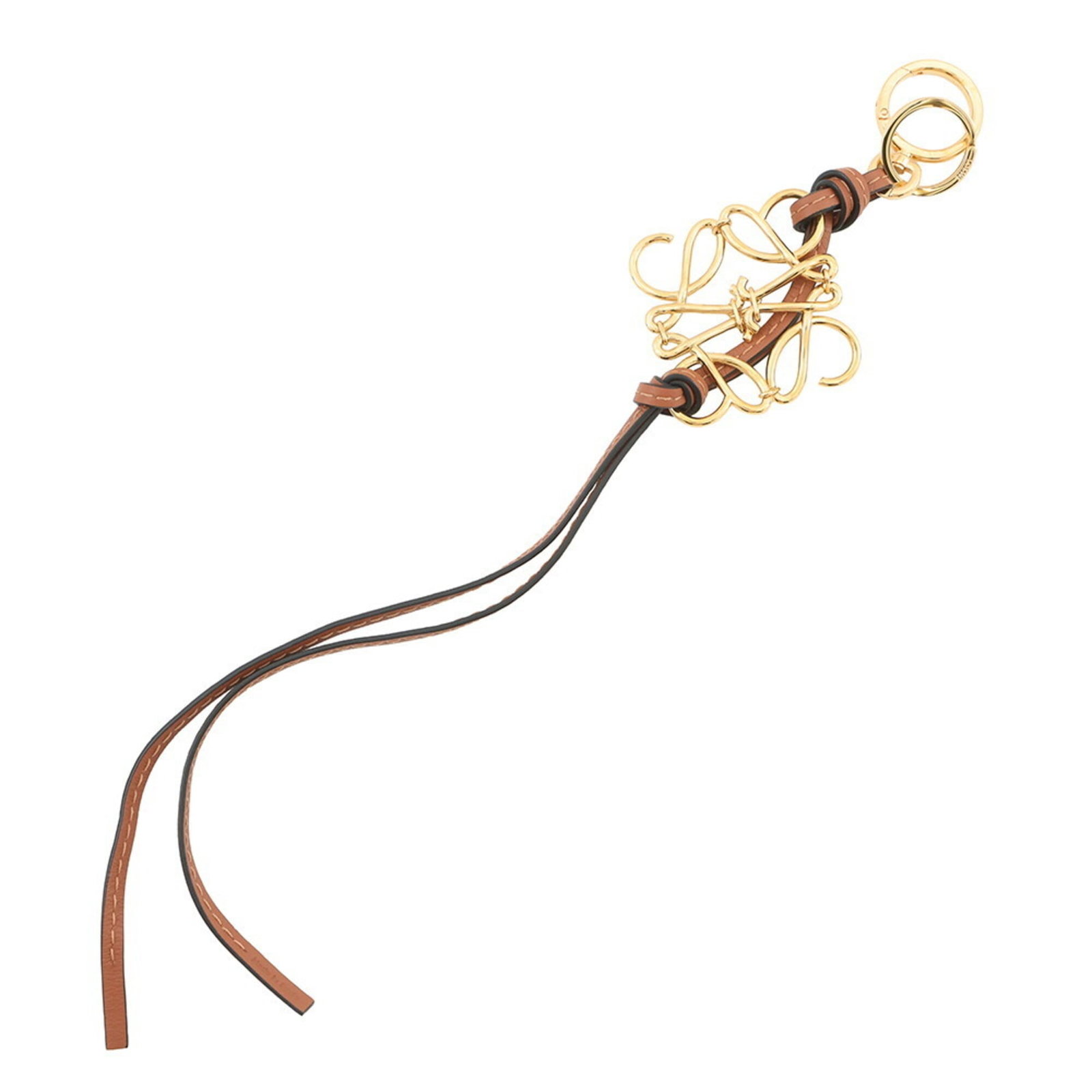 LOEWE Handbag Charm Leather: LOEWE Handbag Charm Leather The LOEWE Handbag Charm Leather is a beautifully crafted, brown leather charm with a subtle sheen, measuring 8mm in diameter. This charming accessory features a chain