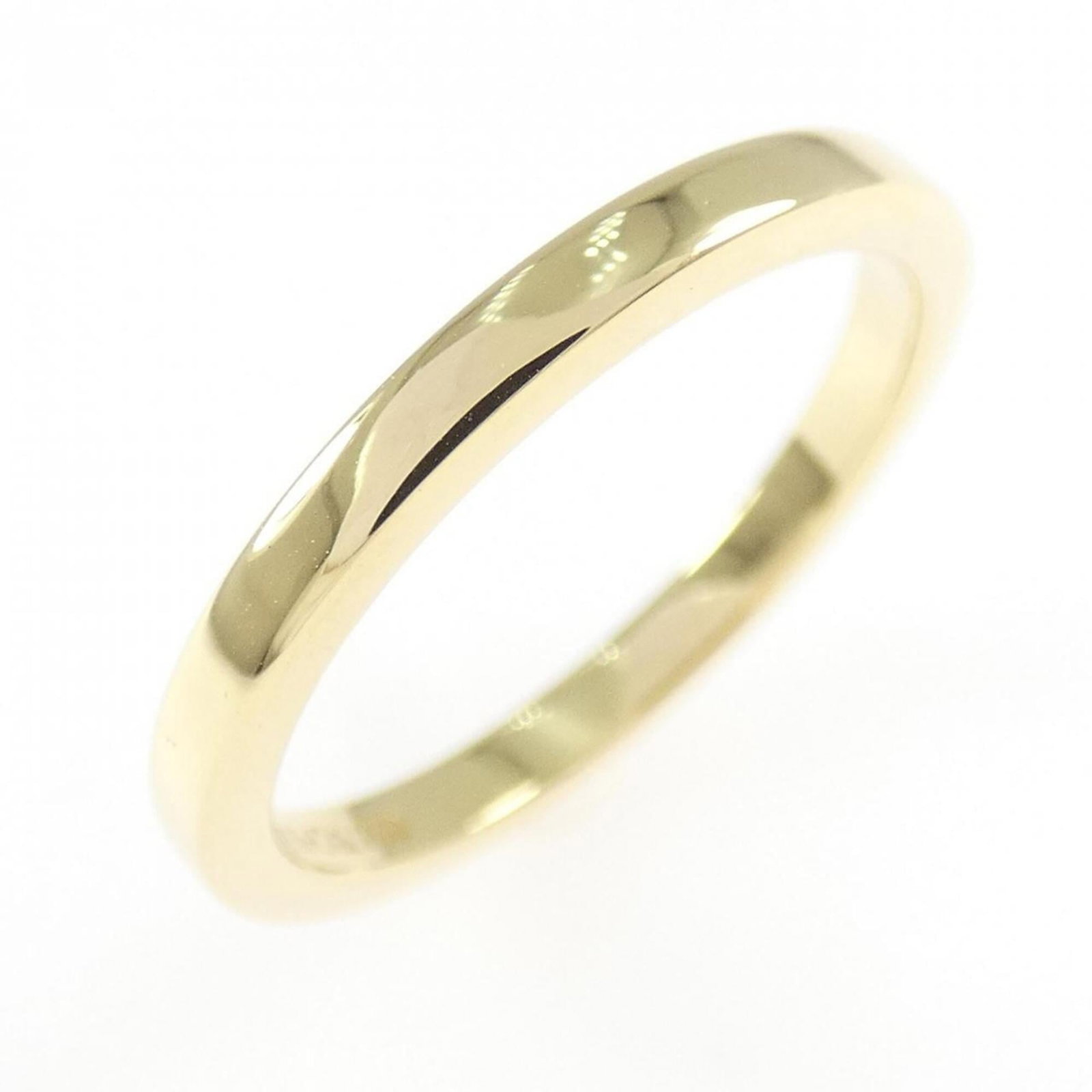 TIFFANY Band Ring Yellow Gold (18K): TIFFANY Band Ring Yellow Gold (18K) Yellow gold (18K) band ring from Tiffany, a classic design that exudes elegance and sophistication. The ring features a subtle yellow gold tone and a very good