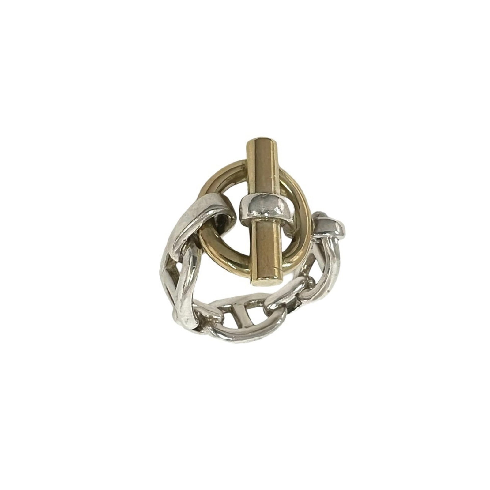 HERMES Band Ring Silver Yellow Gold (18K): HERMES Band Ring Silver Yellow Gold (18K) Silver and yellow gold 18K band ring from Hermes, featuring a classic design. This used band ring shows visible wear with scratches and scuffs, but remains fu