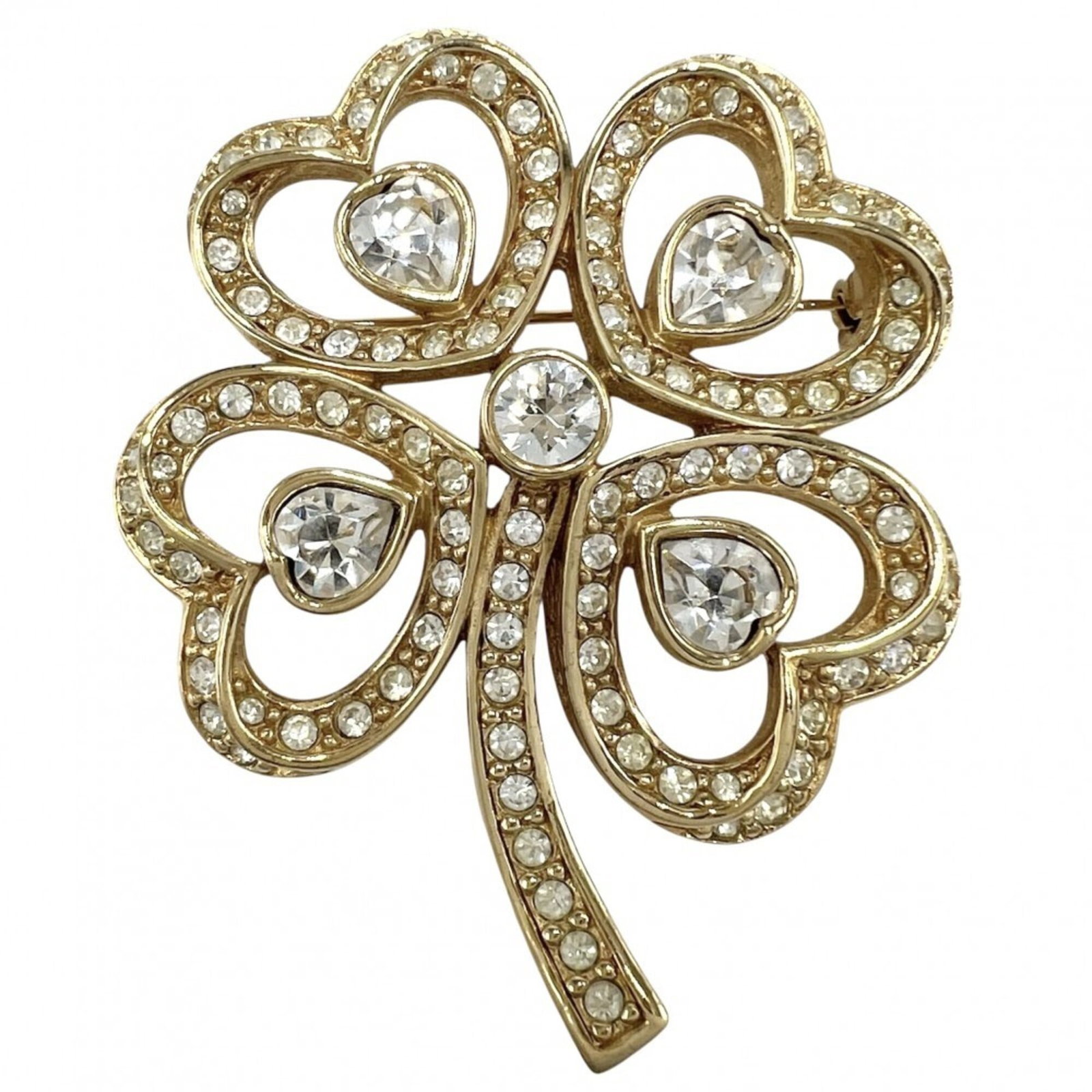 CHRISTIAN DIOR Brooch Rhinestone: CHRISTIAN DIOR Brooch Rhinestone The Christian Dior brooch is a stunning piece featuring intricate rhinestone details in gold. Measuring 5.5cm x 4.5cm x 5.00mm, it boasts a delicate design that adds a