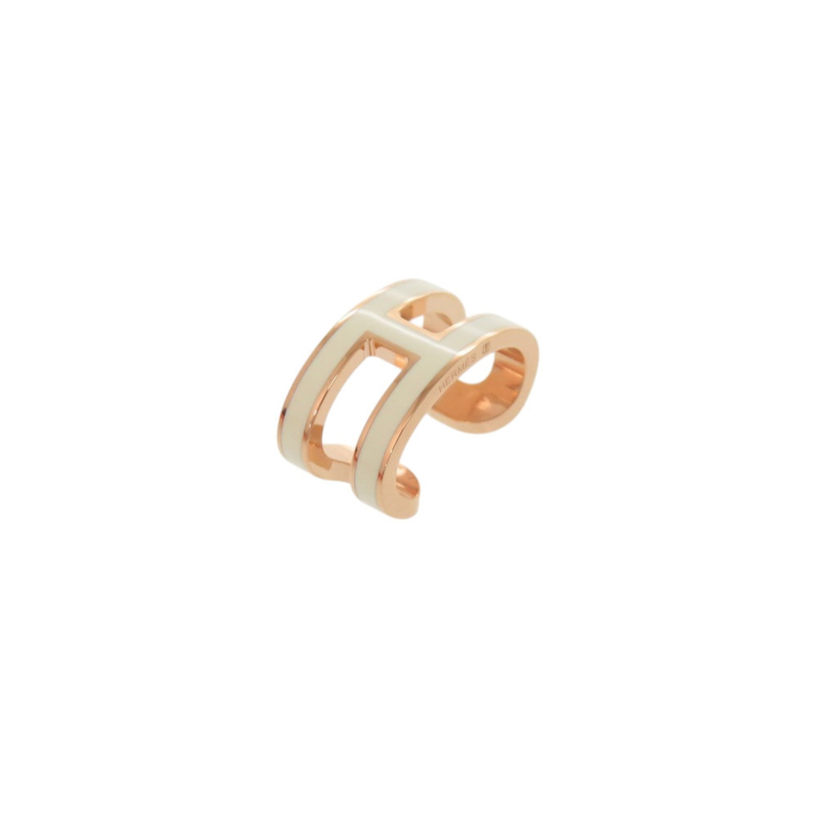 HERMES Earcuff Metal: HERMES Earcuff Metal The Hermes Earcuff Metal is a delicate, white metal earcuff with a subtle 15.00mm x 8.00mm size, bearing minor signs of wear. Gently used, it features small scratches or light
