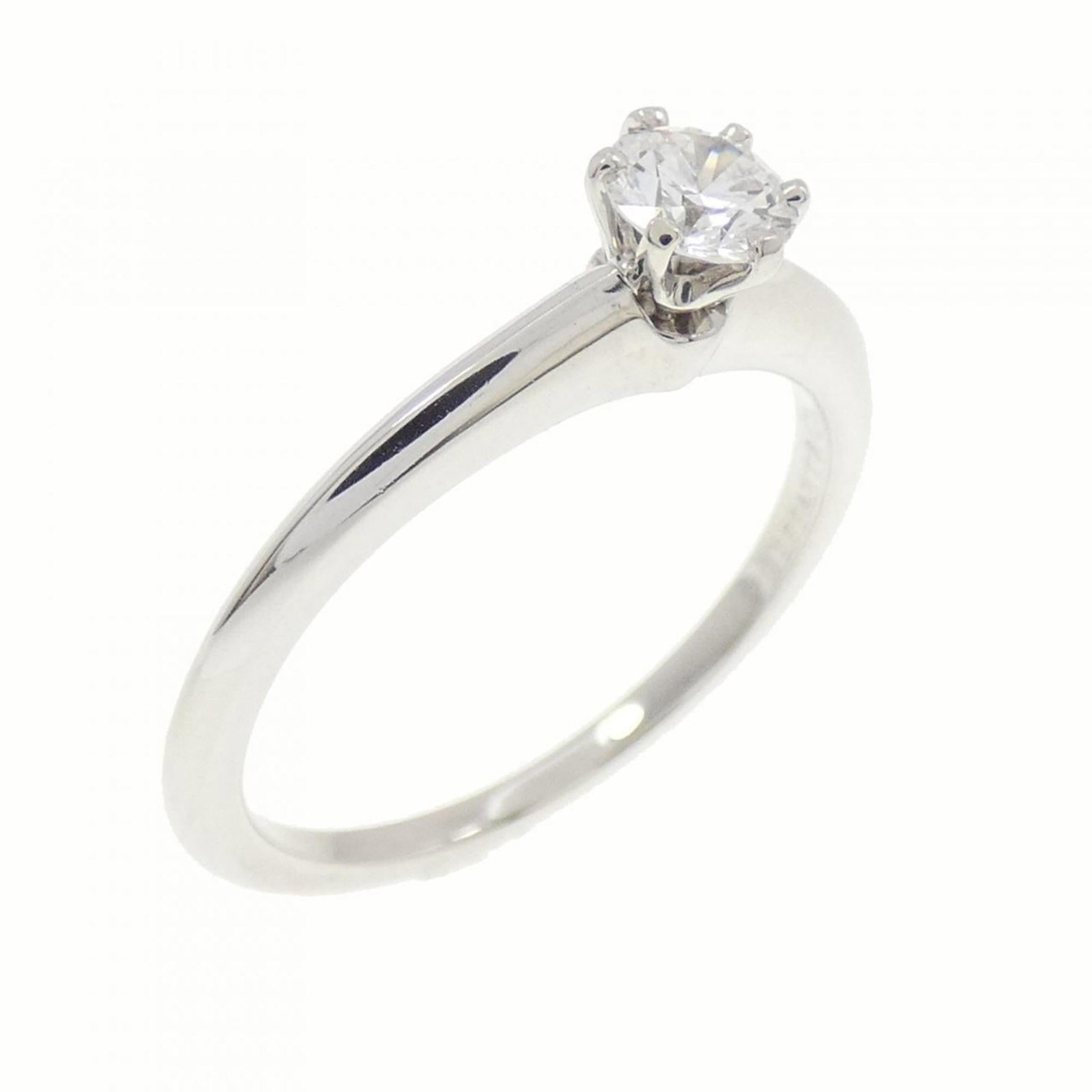 TIFFANY Band Ring Platinum 950: TIFFANY Band Ring Platinum 950 Platinum 950 band ring from Tiffany, featuring a 0.22ct diamond with a VVS1 clarity and E color grade, set in a sleek platinum band. This gently used ring showcases mino