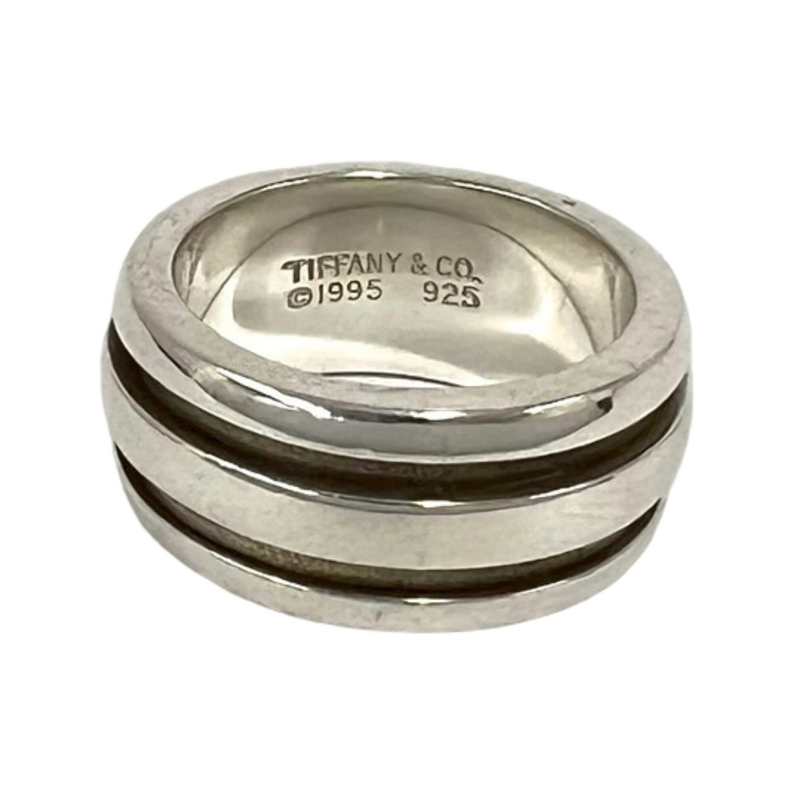 TIFFANY Band Ring Silver 925: TIFFANY Band Ring Silver 925 Silver 925 band ring from Tiffany, a classic design with visible wear, scratches, and scuffs. The item is fully functional and in good overall condition, bearing a signatu