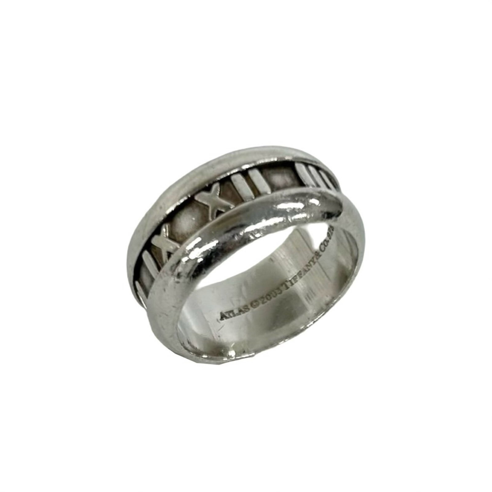 TIFFANY Band Ring Silver 925: TIFFANY Band Ring Silver 925 Silver 925 band ring from Tiffany, a classic design with a subtle sheen. The ring features a simple band with a silver finish, bearing a visible signature. With minor scra