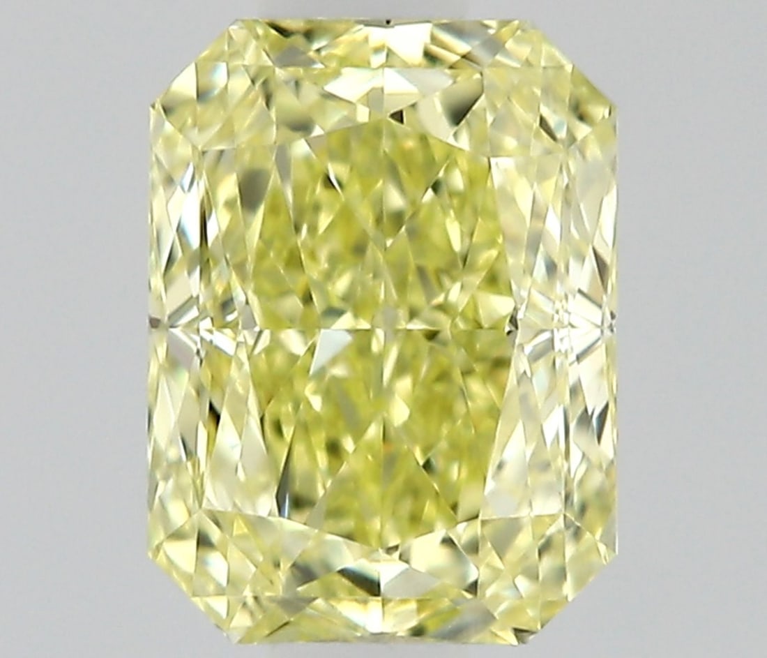 GIA Radiant 0.63ct Fancy Yellow VVS1 - Loose Natural Diamond: GIA Radiant 0.63ct Fancy Yellow VVS1 - Loose Natural Diamond GIA-certified, this 0.63ct Fancy Yellow VVS1 diamond boasts exceptional clarity and vibrant color, with EX polish and VG symmetry. The loos