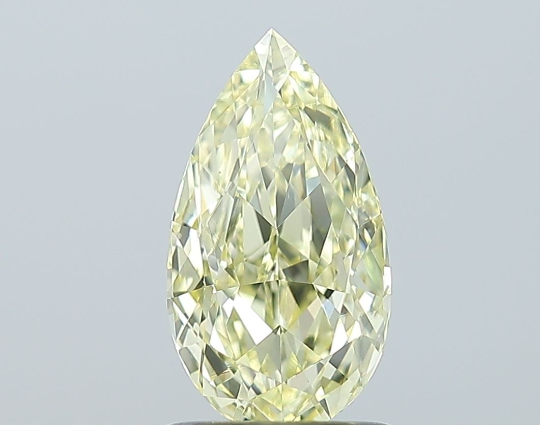 GIA Pear 1.0ct Fancy Yellow VVS2 - Loose Natural Diamond: GIA Pear 1.0ct Fancy Yellow VVS2 - Loose Natural Diamond GIA-certified, this 1.0ct Fancy Yellow VVS2 diamond boasts exceptional clarity and polish, with a vibrant yellow hue that shines through in