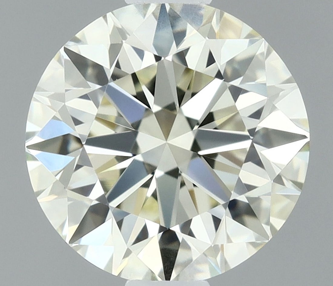 IGI Round 0.9ct K VVS1 - Loose Natural Diamond: IGI Round 0.9ct K VVS1 - Loose Natural Diamond IGI Round 0.9ct K VVS1 - Loose Natural DiamondThis 0.9ct round diamond boasts exceptional clarity and color, certified by the International Gemological