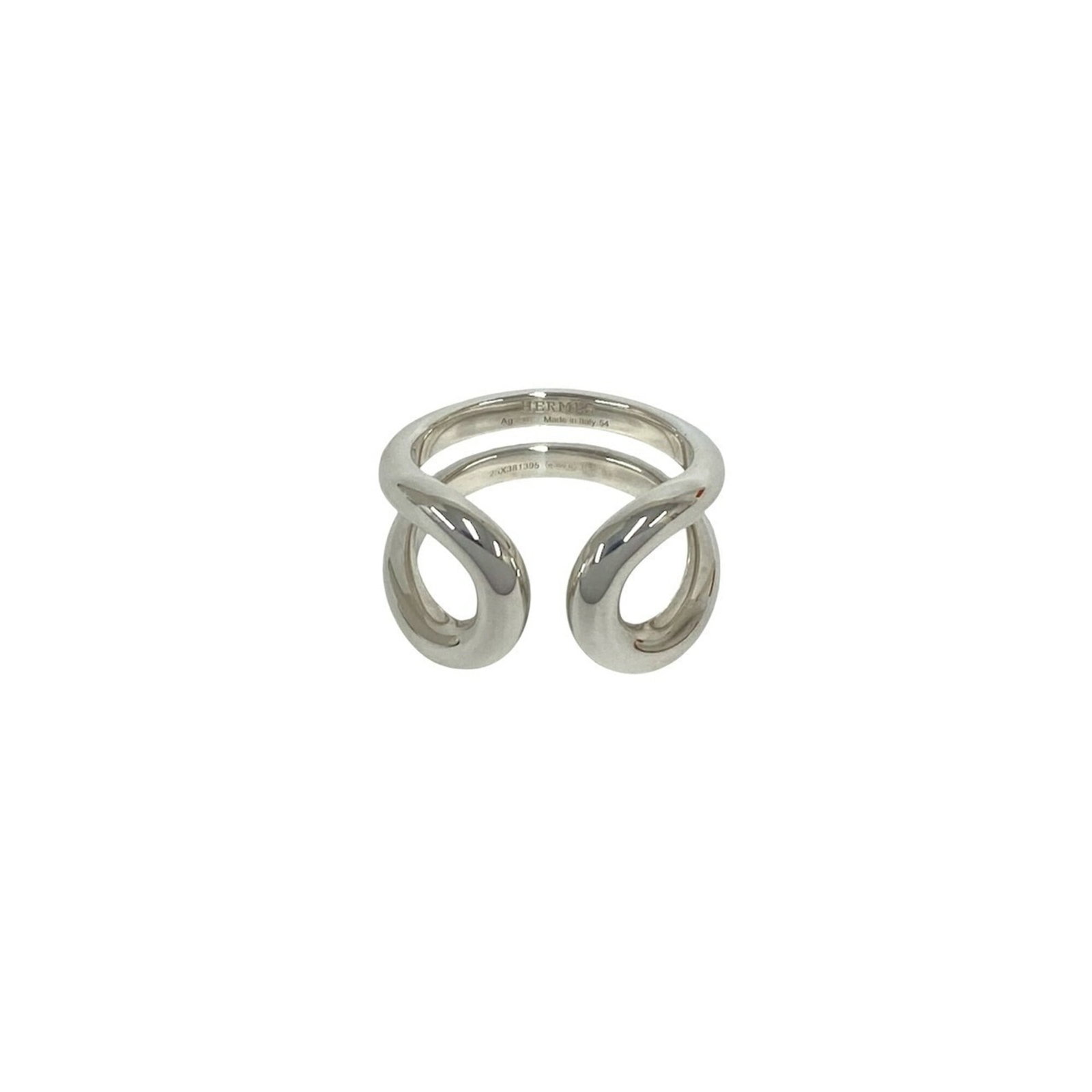 HERMES Band Ring Silver 925: HERMES Band Ring Silver 925 Silver 925 band ring from Hermes, a classic women's accessory featuring a sleek and modern design. The ring bears visible signs of wear, including scratches and scuffs,