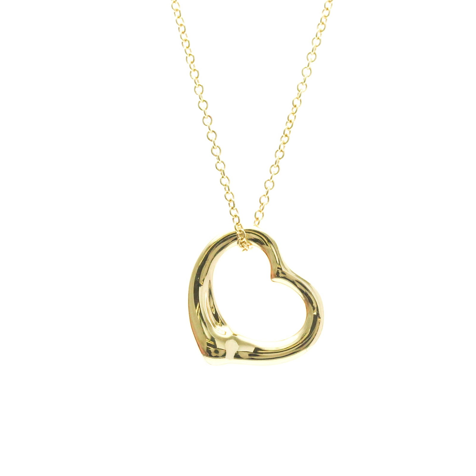 TIFFANY Yellow Gold (18K): TIFFANY Yellow Gold (18K) Yellow gold (18K) pendant necklace from Tiffany's Open Heart collection, featuring a 15.5mm x 15.8mm gold pendant with a 41 cm / 16.14'' chain. This gently used necklace show