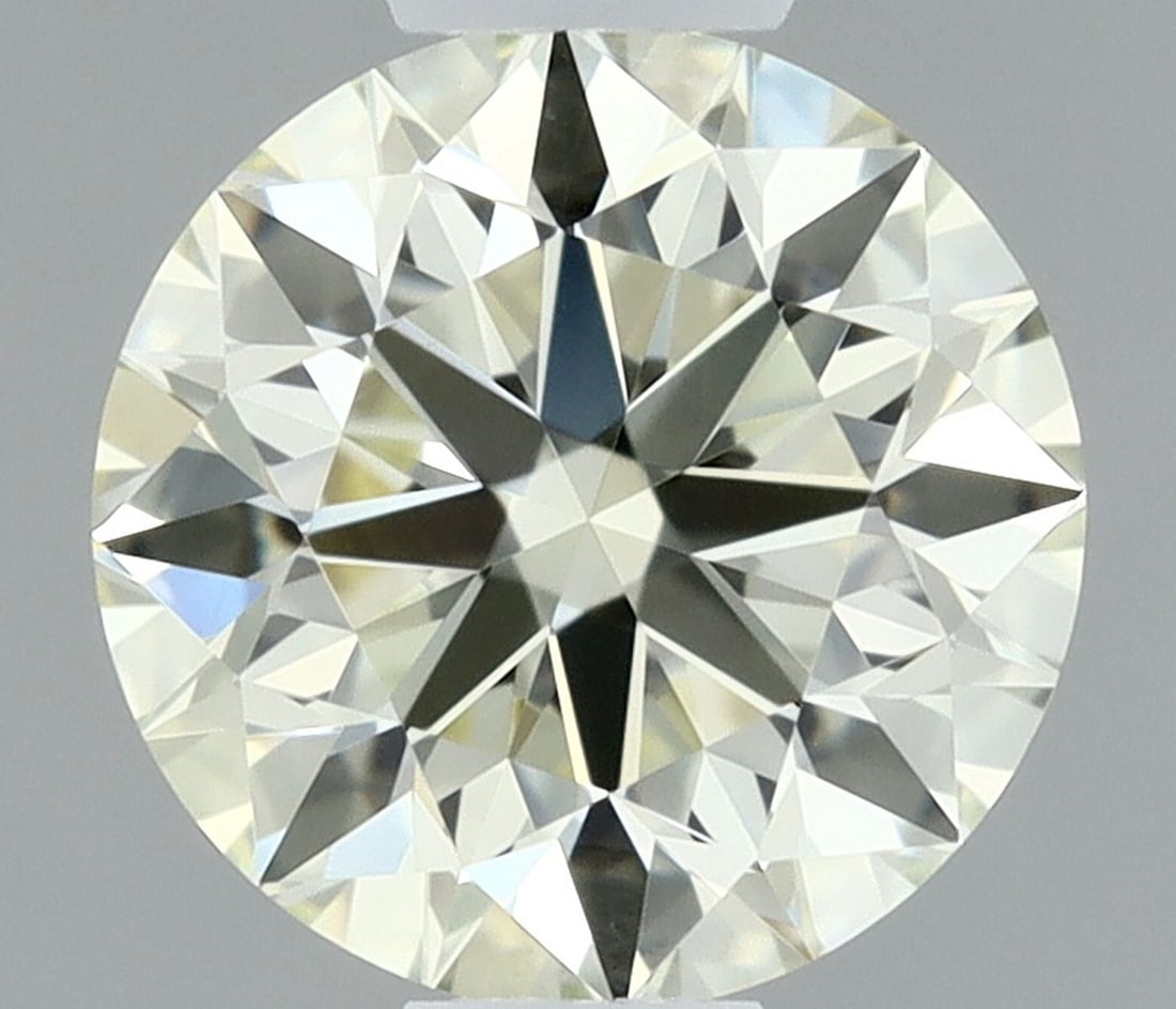 IGI Round 0.42ct M VVS1 - Loose Natural Diamond: IGI Round 0.42ct M VVS1 - Loose Natural Diamond The IGI Round 0.42ct M VVS1 - Loose Natural Diamond is a rare and exceptional gemstone, boasting an EX cut, M color, and VVS1 clarity. Its EX polish and