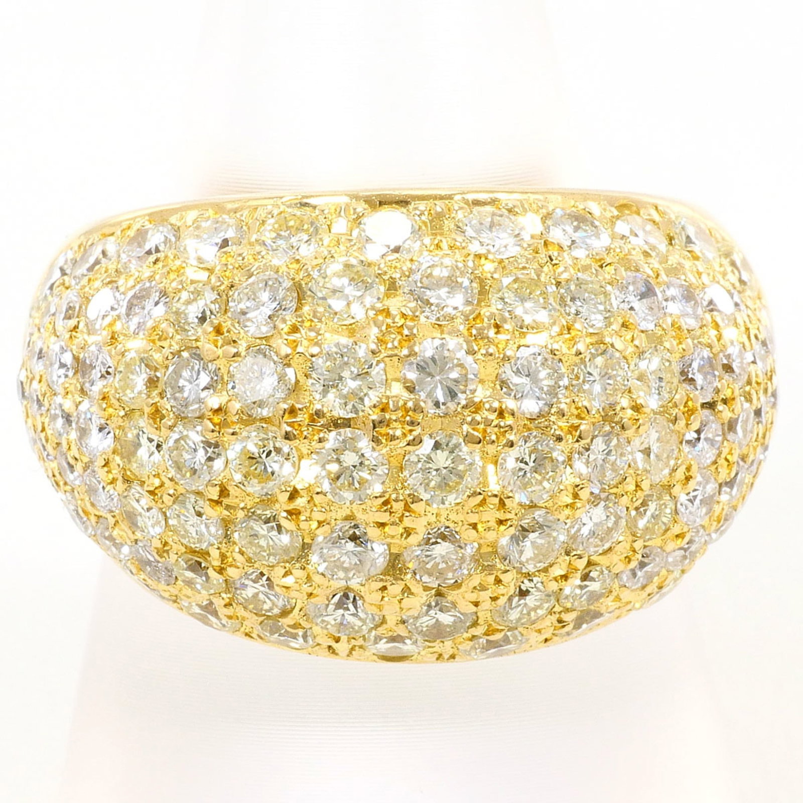 Band Ring Yellow Gold (18K): Band Ring Yellow Gold (18K) Yellow gold band ring with a 5.02 carat diamond, crafted from 18K gold for a luxurious feel. This 10 US size ring boasts a 17mm width and weighs 42.3g, making it a statemen