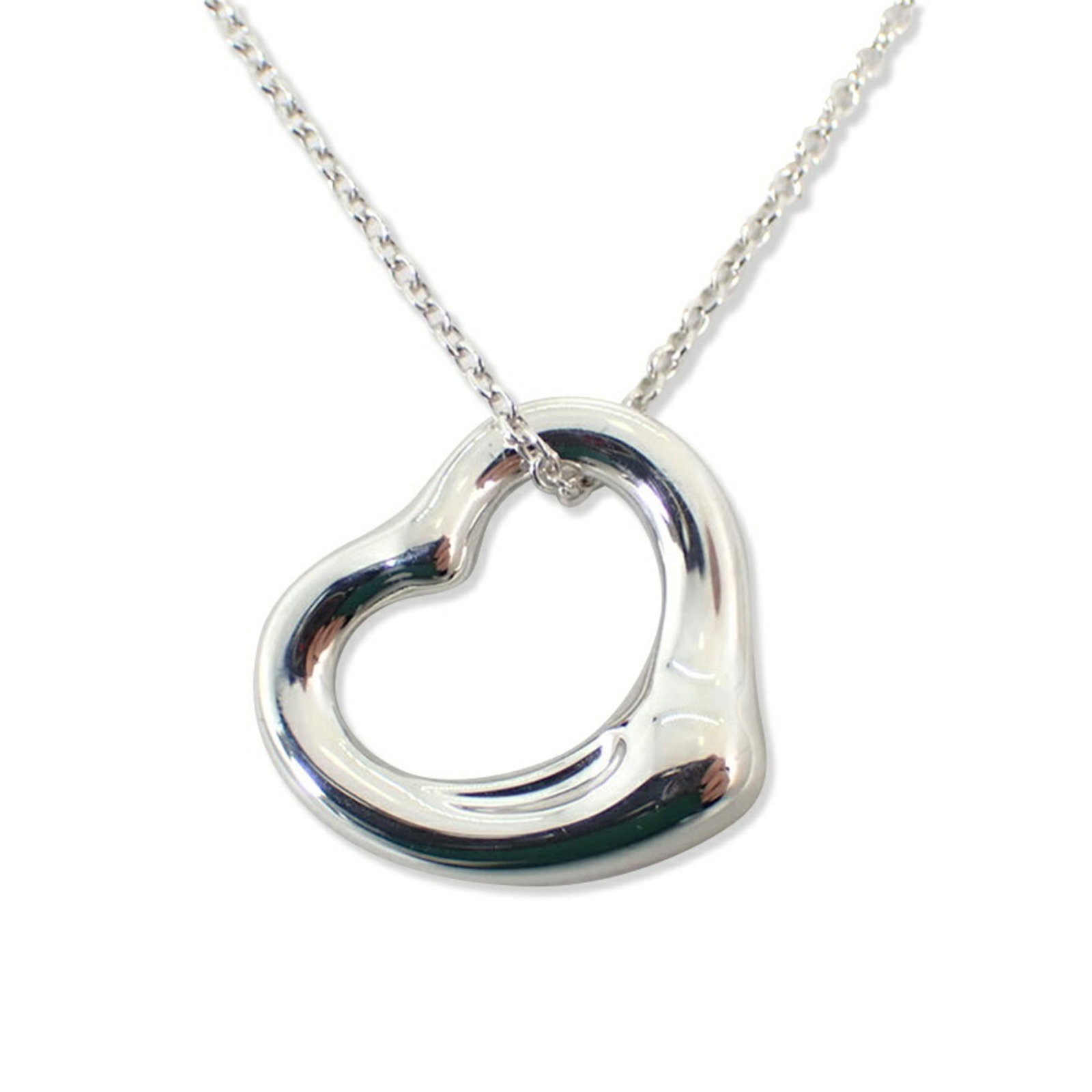 TIFFANY Sterling Silver 925: TIFFANY Sterling Silver 925 Sterling silver 925 pendant necklace from Tiffany, featuring a beautiful design in a silver finish. The necklace has a 40.5 cm circumference and a pendant size of 14.3mm x