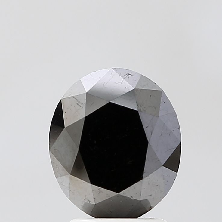 Oval 3.1ct Black VVS2 - Loose Natural Diamond: Oval 3.1ct Black VVS2 - Loose Natural Diamond 3.1ct Black VVS2 - Loose Natural Diamond. This oval-cut diamond boasts an EX polish and symmetry, giving it a radiant appearance. With its VVS2 clarity