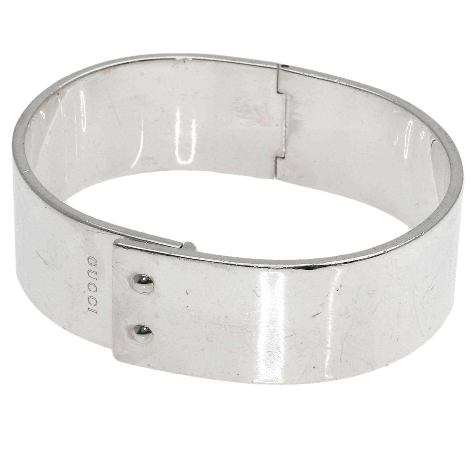 GUCCI Bangle Silver: GUCCI Bangle Silver Silver bangle from Gucci, measuring 16.5cm in length, features a gently used condition with minor signs of wear, including small scratches or light marks. The item is in very good 