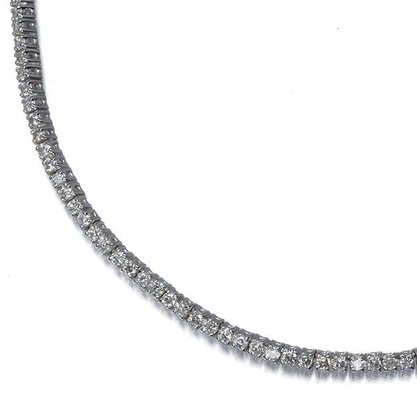 Diamond 1.00Ct Tennis Bracelet 18K 750 White Gold: Diamond 1.00Ct Tennis Bracelet 18K 750 White Gold The 1.00ct diamond tennis bracelet is set in 18k white gold, featuring a natural diamond with some surface-reaching fractures and slight cracks that