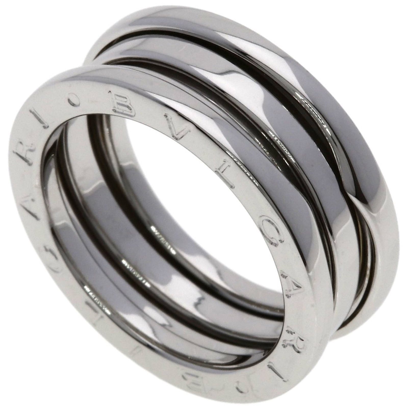 BVLGARI Band Ring White Gold (18K): BVLGARI Band Ring White Gold (18K) Bvlgari's iconic band ring in white gold (18K) offers a sleek, sophisticated look. With its 8.1mm width and 6.5 US size, this ring is designed to complement a