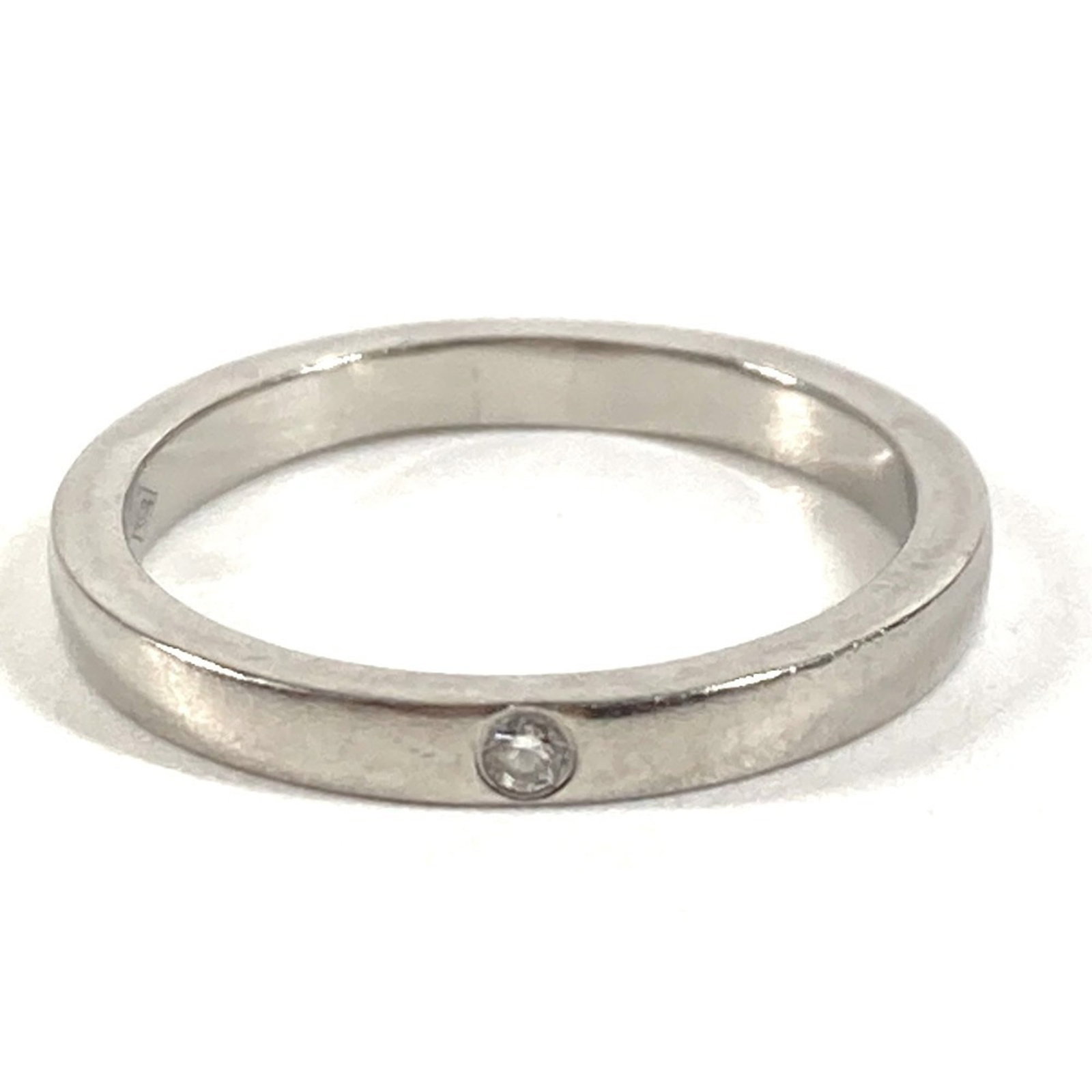 CARTIER Band Ring Silver 925: CARTIER Band Ring Silver 925 Silver 925 Cartier Band Ring with Diamond Stone, Size 3.5, in Very Good Condition. Gently used with minor signs of wear, this elegant band ring features a silver 925 mater