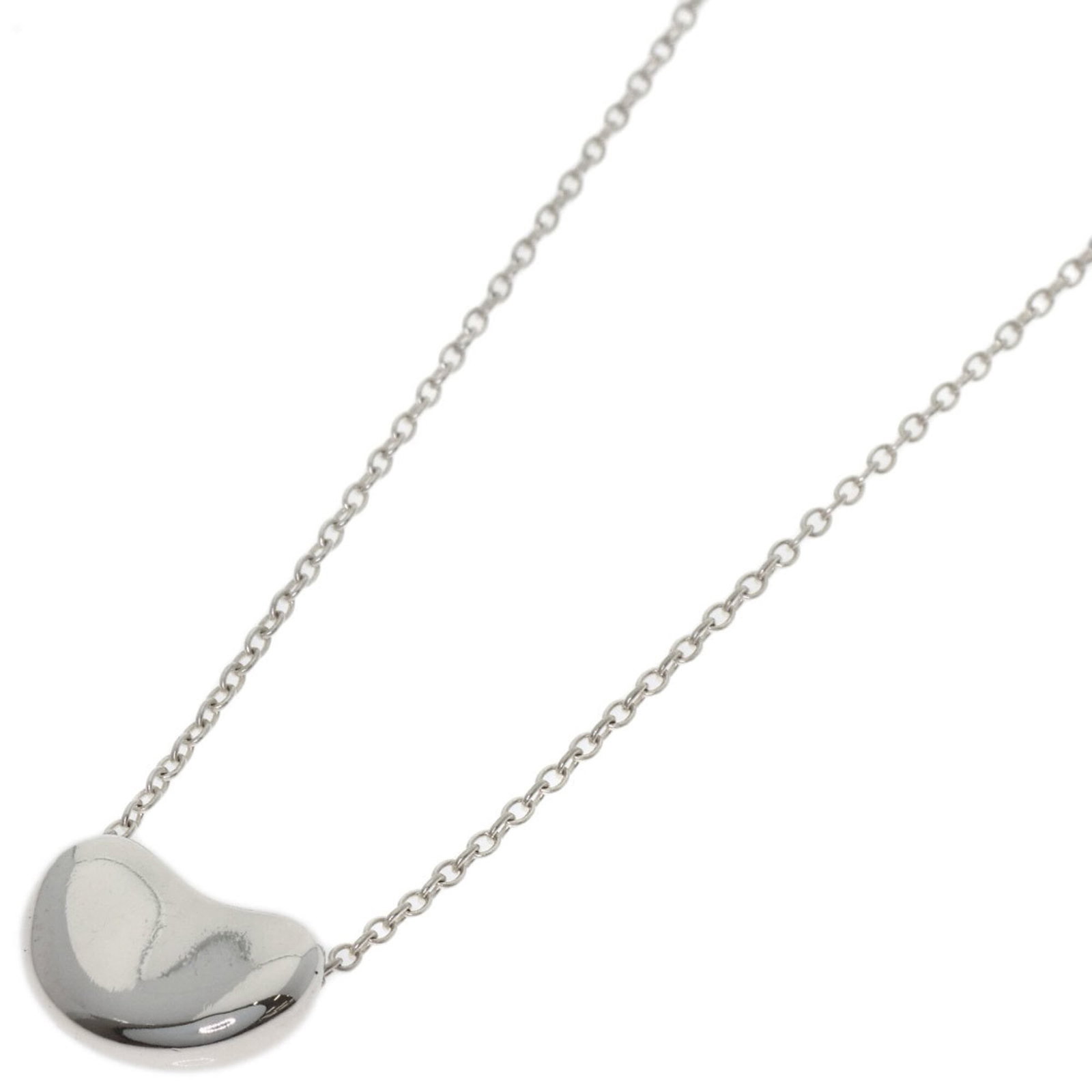 TIFFANY Silver Necklace: TIFFANY Silver Necklace Silver necklace from Tiffany featuring a 7.8mm x 11mm pendant, crafted from high-quality silver. The necklace measures 45.5 cm in circumference and bears a signature. Gently