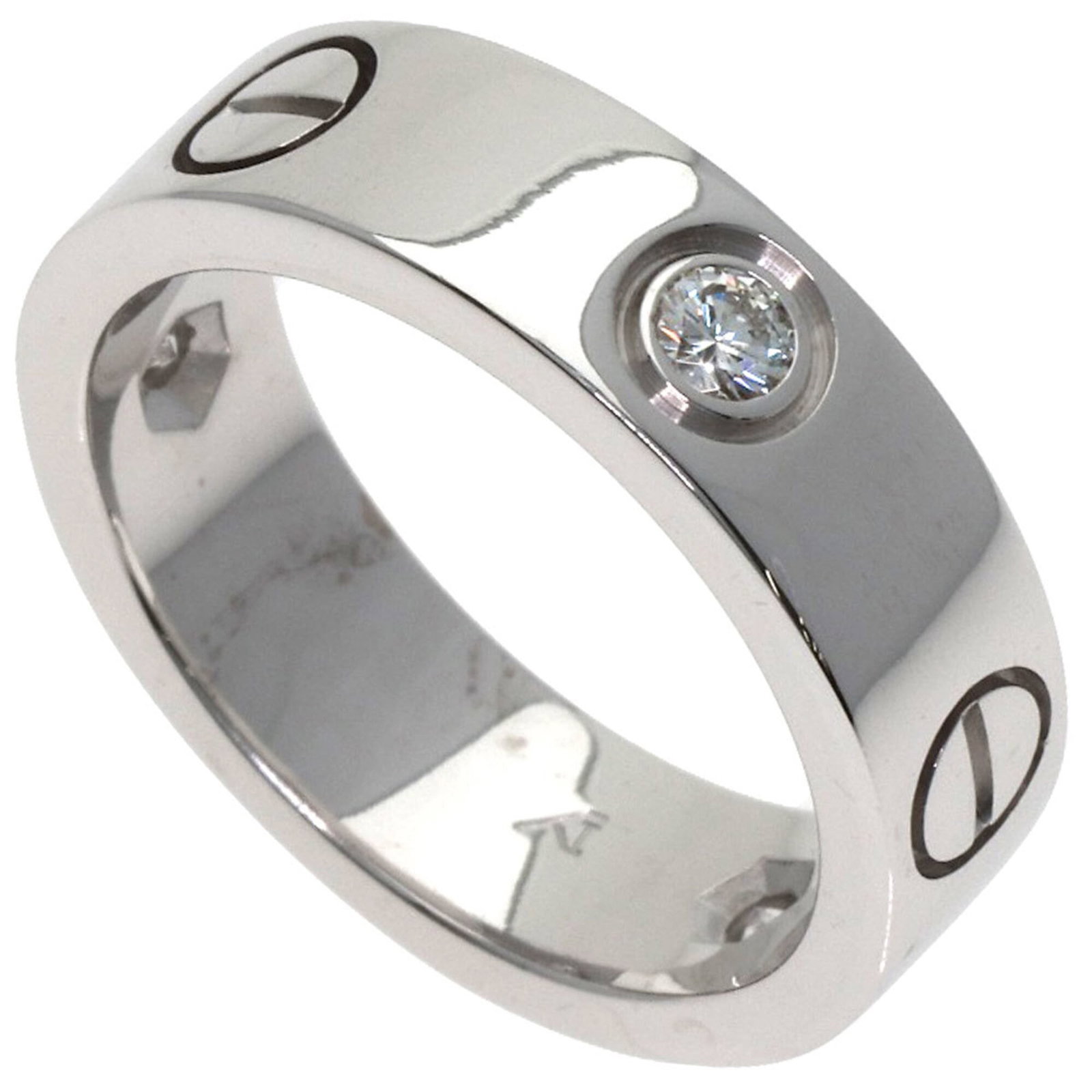 CARTIER Band Ring White Gold (18K): CARTIER Band Ring White Gold (18K) 18K white gold band ring from Cartier, featuring a diamond stone and a slender 5.5mm width, this elegant piece is a testament to timeless design. Gently used with mi