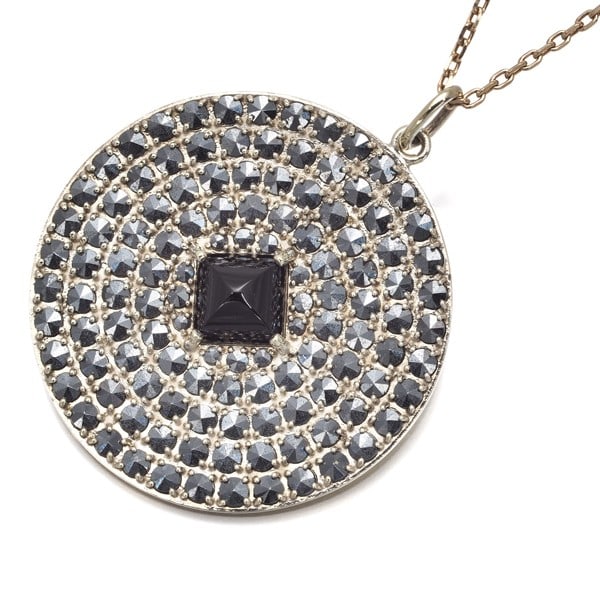 Cocoshnik Necklace Onyx Marcasite Circle 10K 416 Yellow Gold: Cocoshnik Necklace Onyx Marcasite Circle 10K 416 Yellow Gold Yellow gold pendant on a 10k chain, featuring a natural onyx stone surrounded by marcasite, adds a touch of elegance to any outfit. The 10k