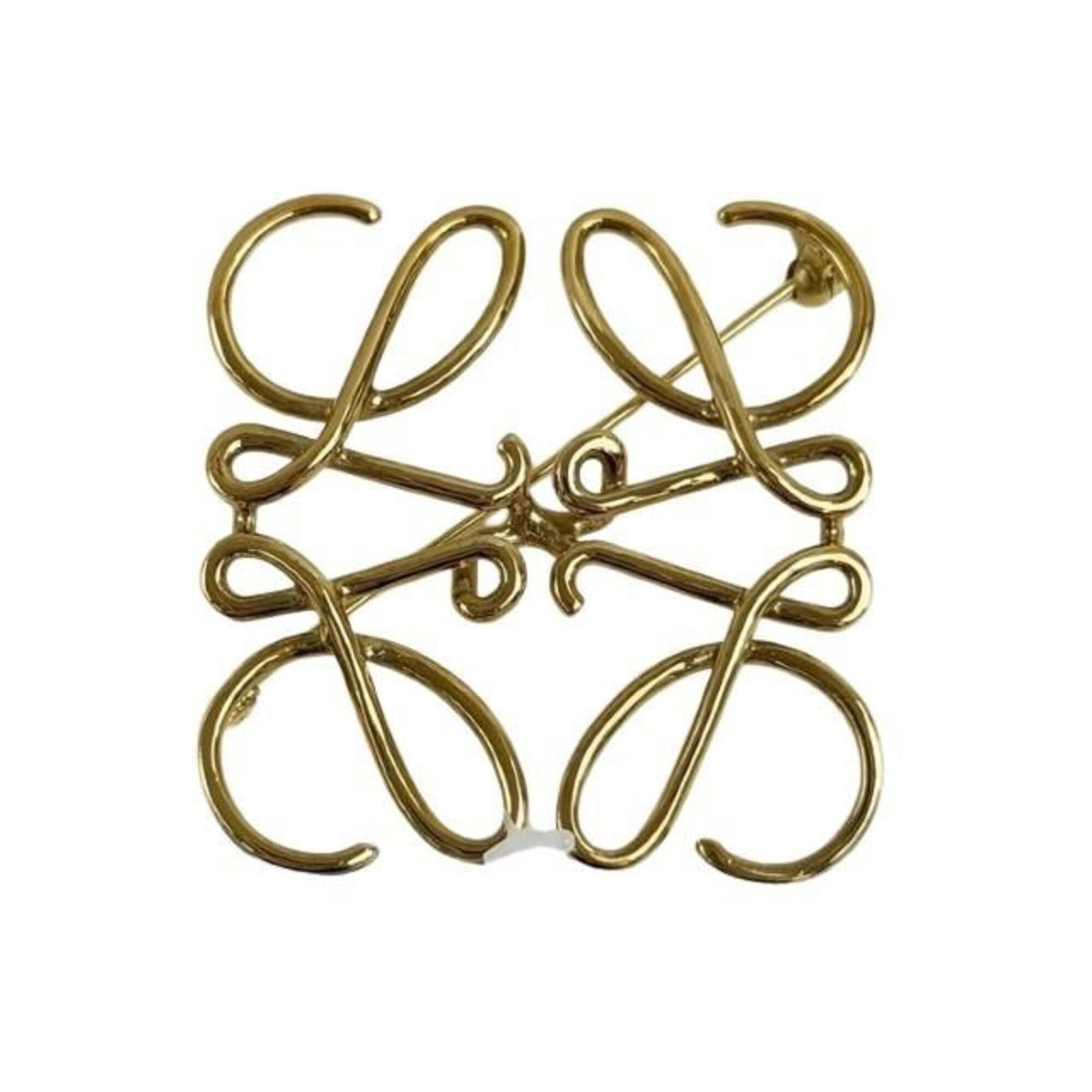 LOEWE Brooch Metal: LOEWE Brooch Metal Gently used Loewe brooch in gold metal, bearing minor signs of wear with small scratches or light marks. The item is in very good condition, measuring 5cm x 4.9cm. A small, elegant 