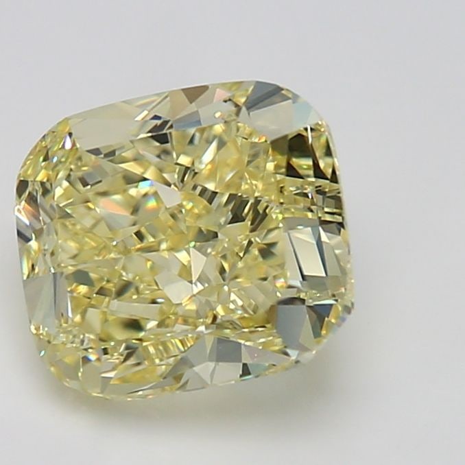 GIA Cushion Brilliant 4.02ct Fancy Yellow VVS2 - Loose Natural Diamond: GIA Cushion Brilliant 4.02ct Fancy Yellow VVS2 - Loose Natural Diamond GIA-certified, this 4.02ct Fancy Yellow VVS2 diamond boasts exceptional clarity and a vibrant, sunny hue. Measuring 9.34L x