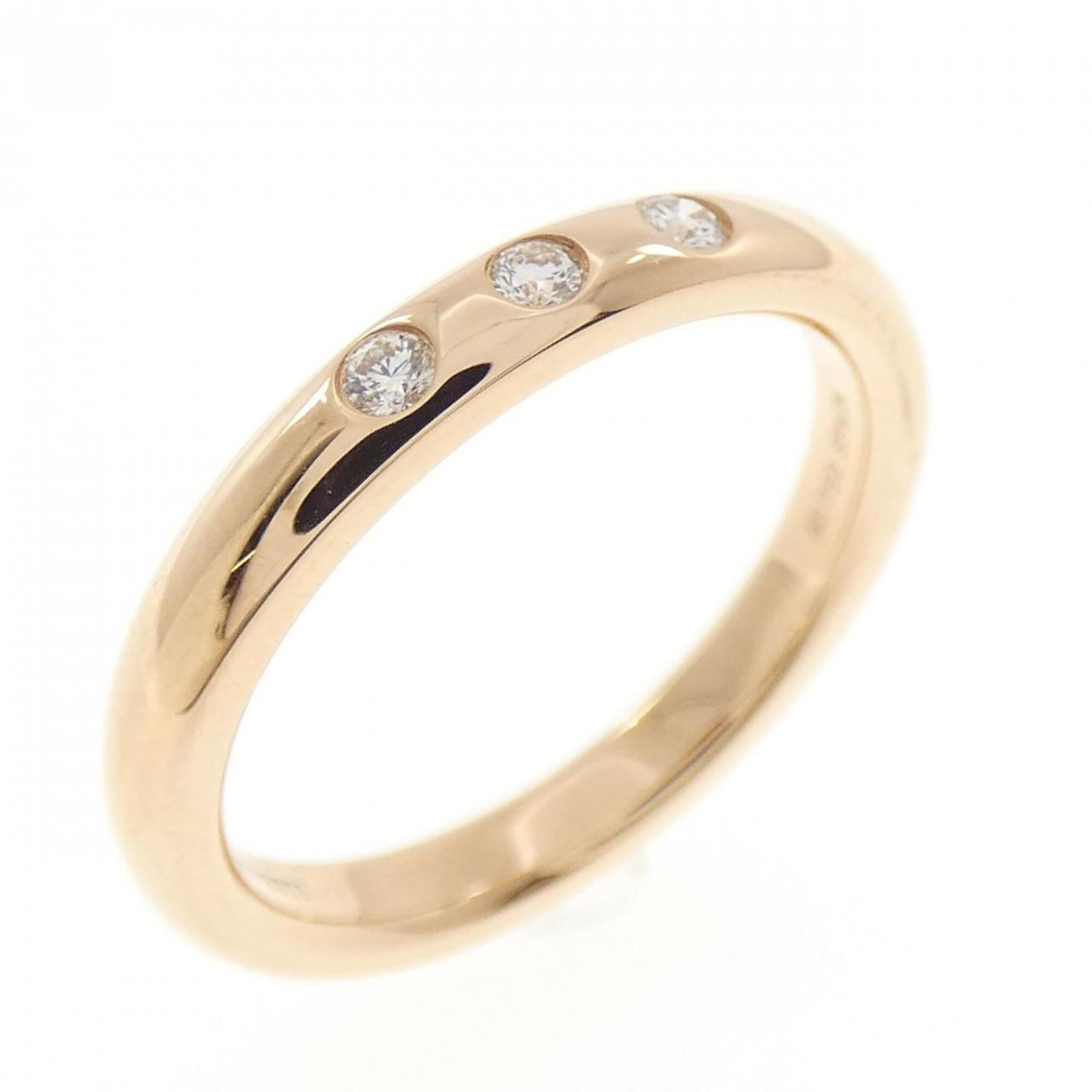 TIFFANY Band Ring Pink Gold (18K): TIFFANY Band Ring Pink Gold (18K) Pink gold band ring from Tiffany, featuring 18K material and a US size 5.5. This like new used ring boasts excellent condition with no visible wear, making it a great
