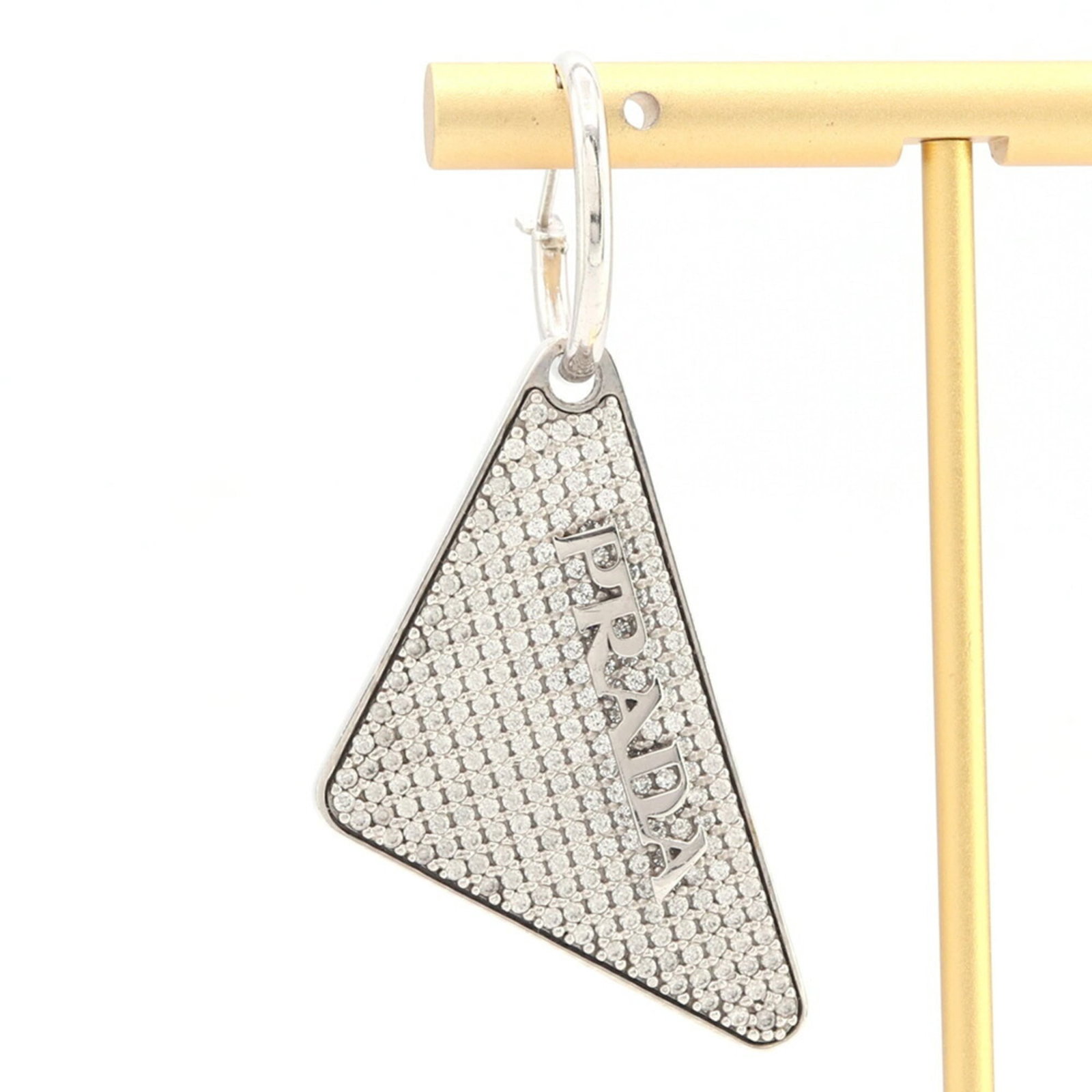 PRADA Clip Earrings Sterling Silver 925: PRADA Clip Earrings Sterling Silver 925 Sterling silver 925 Prada clip earrings with a crystal and zircon stone, measuring 23.00mm x 42.00mm, are available in very good condition. The earrings