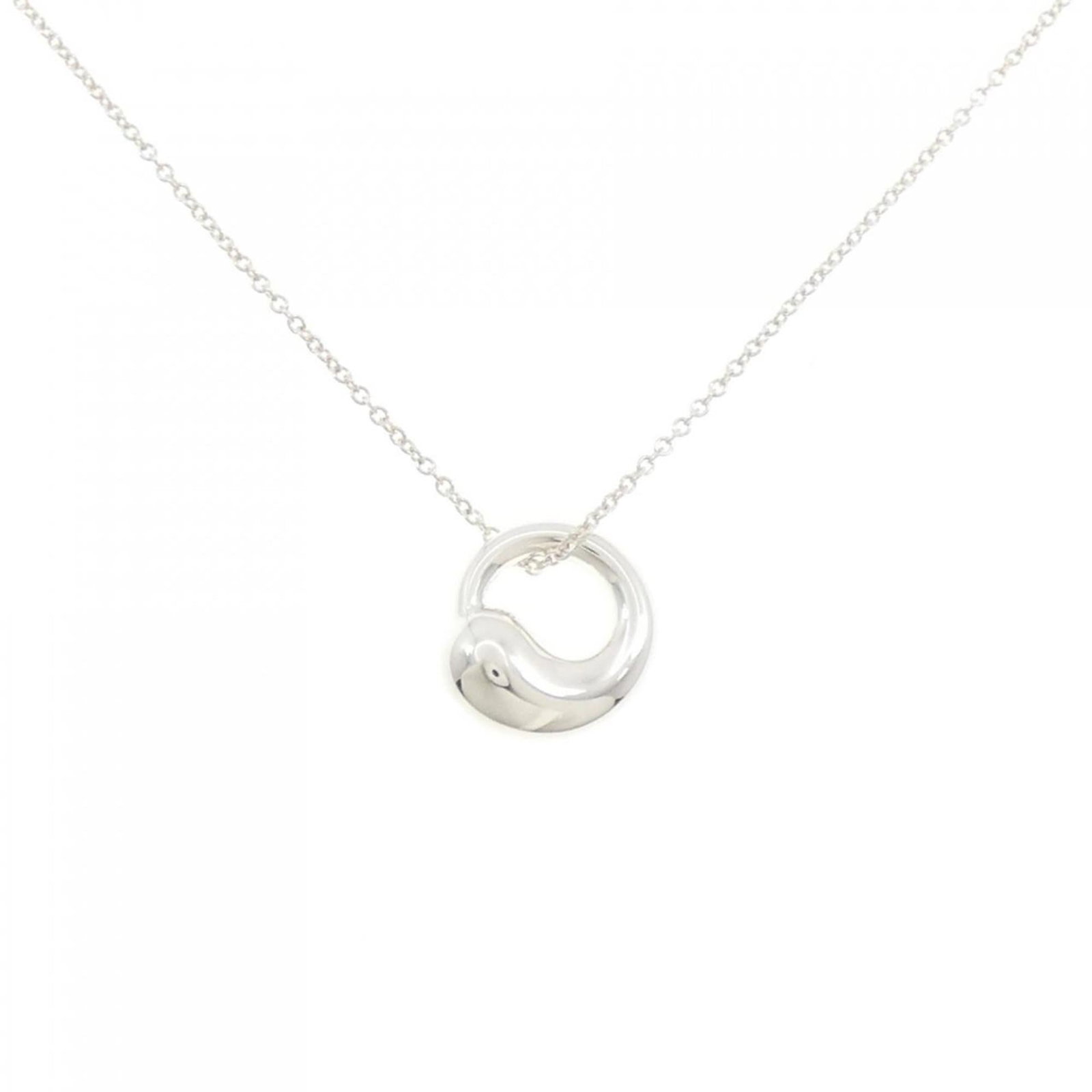 TIFFANY Necklace: TIFFANY Necklace Silver Tiffany Line Eternal Circle Necklace with 13.2mm x 12.4mm Pendant. This gently used necklace features a 41 cm / 16.14'' circumference and weighs 3.8g / 0.13oz. The pendant bear