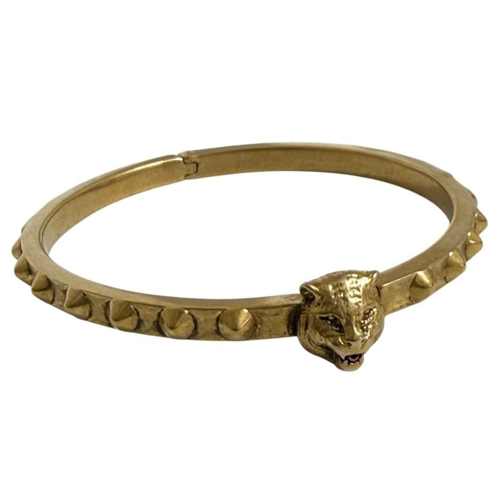 GUCCI Bangle Metal: GUCCI Bangle Metal Gold Metal Bangle from Gucci, Italy, featuring a 16cm length with minor signs of wear. The bangle bears a signature, a hallmark of the luxury brand. Gently used in very good