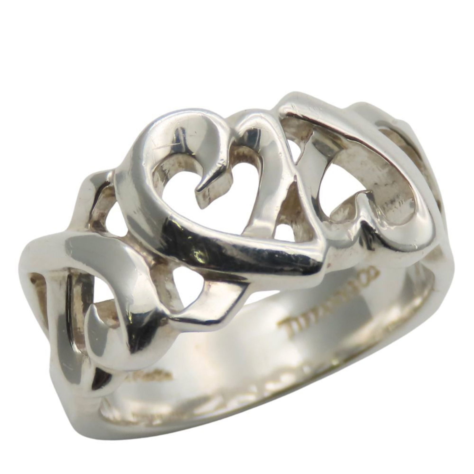 TIFFANY Band Ring Silver 925: TIFFANY Band Ring Silver 925 Silver 925 band ring from Tiffany, featuring a classic design in a durable and long-lasting silver alloy. This band ring shows visible wear, including scratches and