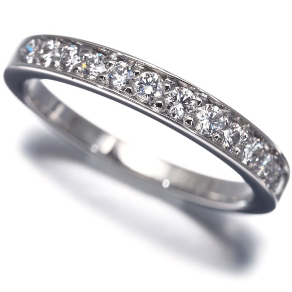 Tiffany&Co. Ring Diamond Half Eternity Us5 950 Platinum: Tiffany&Co. Ring Diamond Half Eternity Us5 950 Platinum Tiffany&Co.'s platinum ring boasts a stunning diamond set in a half eternity design, with a natural diamond weighing an unmarked carat. The 950 