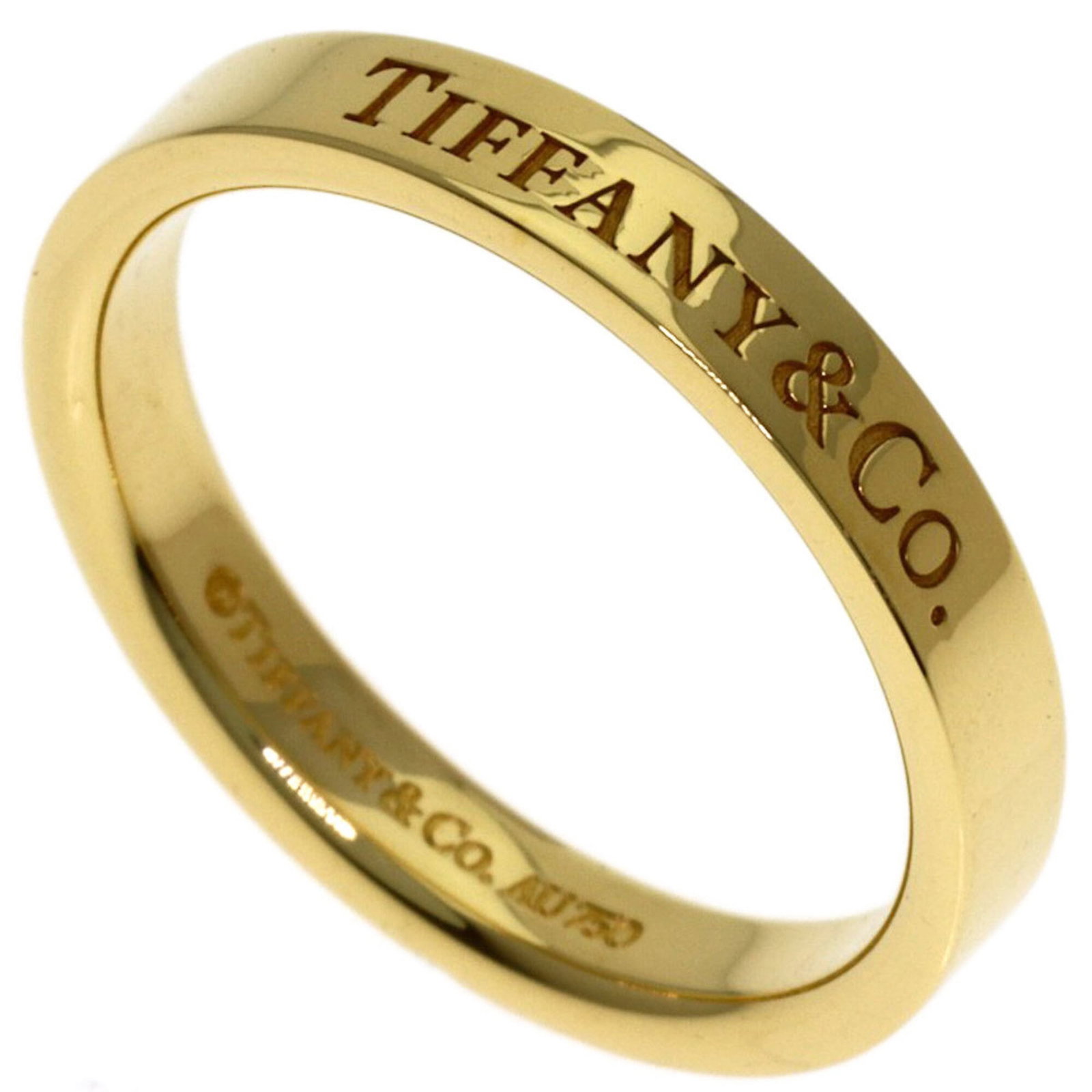 TIFFANY Band Ring Yellow Gold (18K): TIFFANY Band Ring Yellow Gold (18K) Yellow gold (18K) band ring from Tiffany, featuring a sleek and sophisticated design. This like new used ring boasts excellent condition with no visible wear, makin
