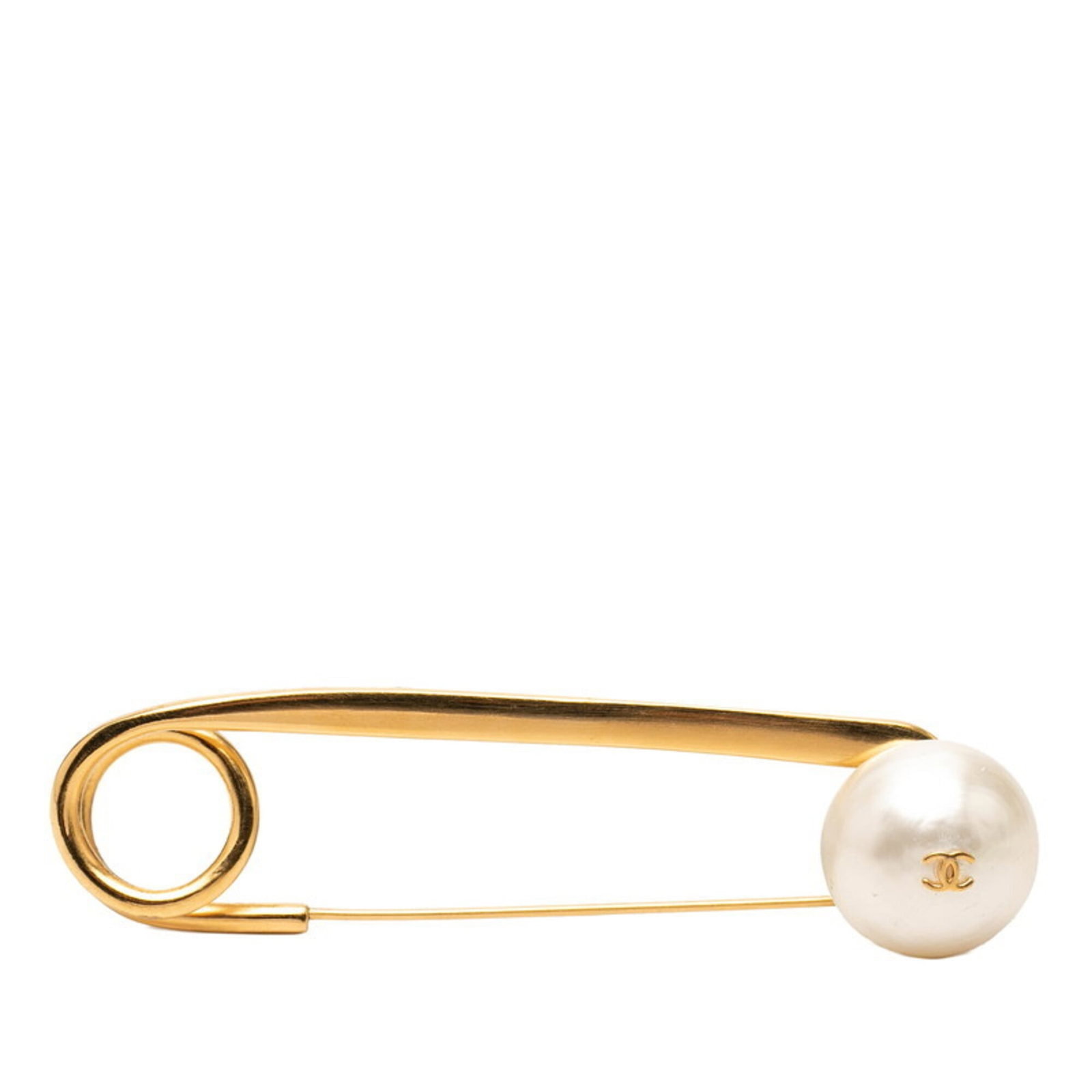 CHANEL Brooch Gold: CHANEL Brooch Gold Gold brooch from the iconic CHANEL brand, featuring a classic design with visible wear and scratches. This vintage piece is in good condition, with some scuffs and dirt present, and