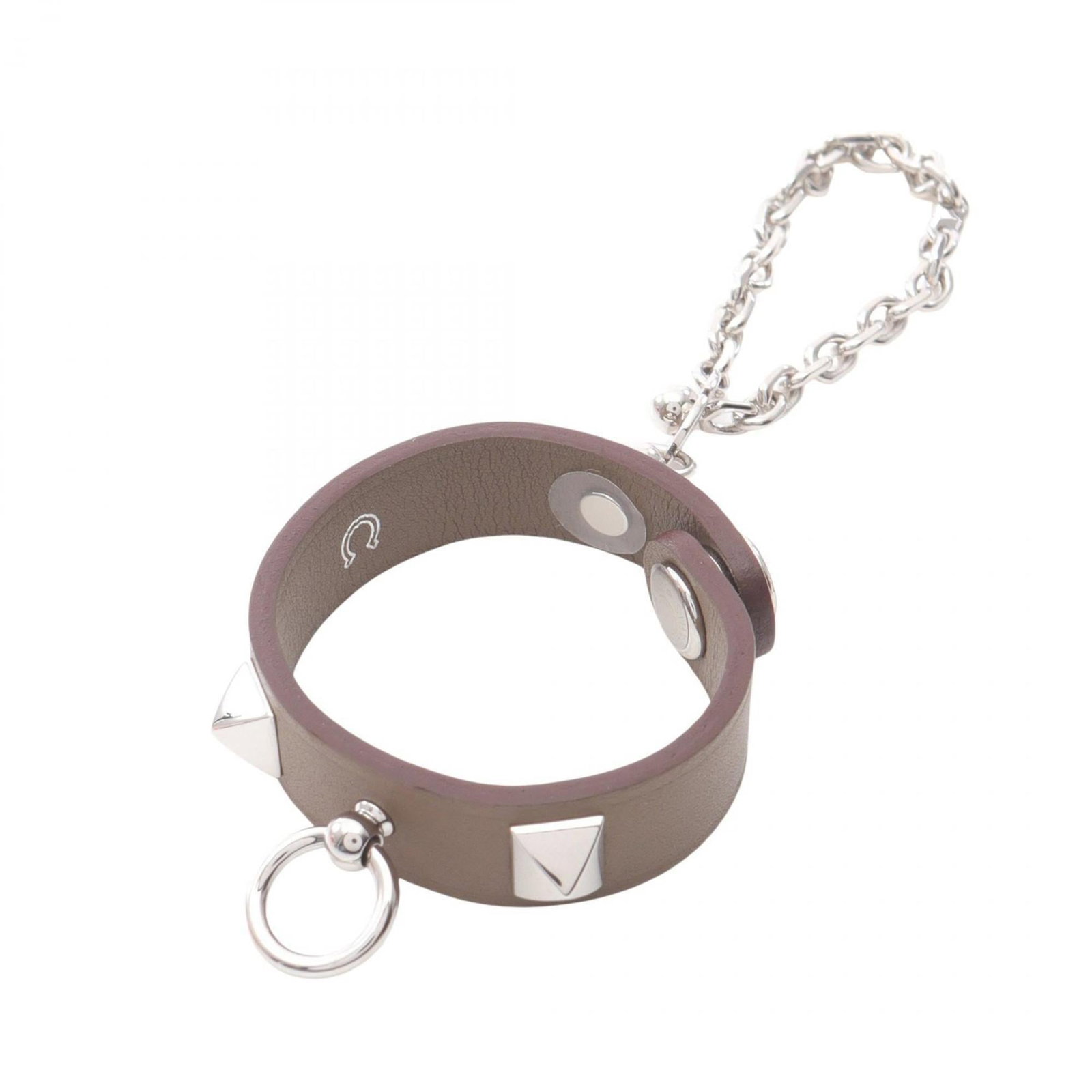 HERMES Handbag Charm Leather: HERMES Handbag Charm Leather Brand new Hermes Handbag Charm Leather in Beige or Etoupe Gray, paired with a sleek Silver finish, adds a touch of sophistication to any handbag. The item comes in its