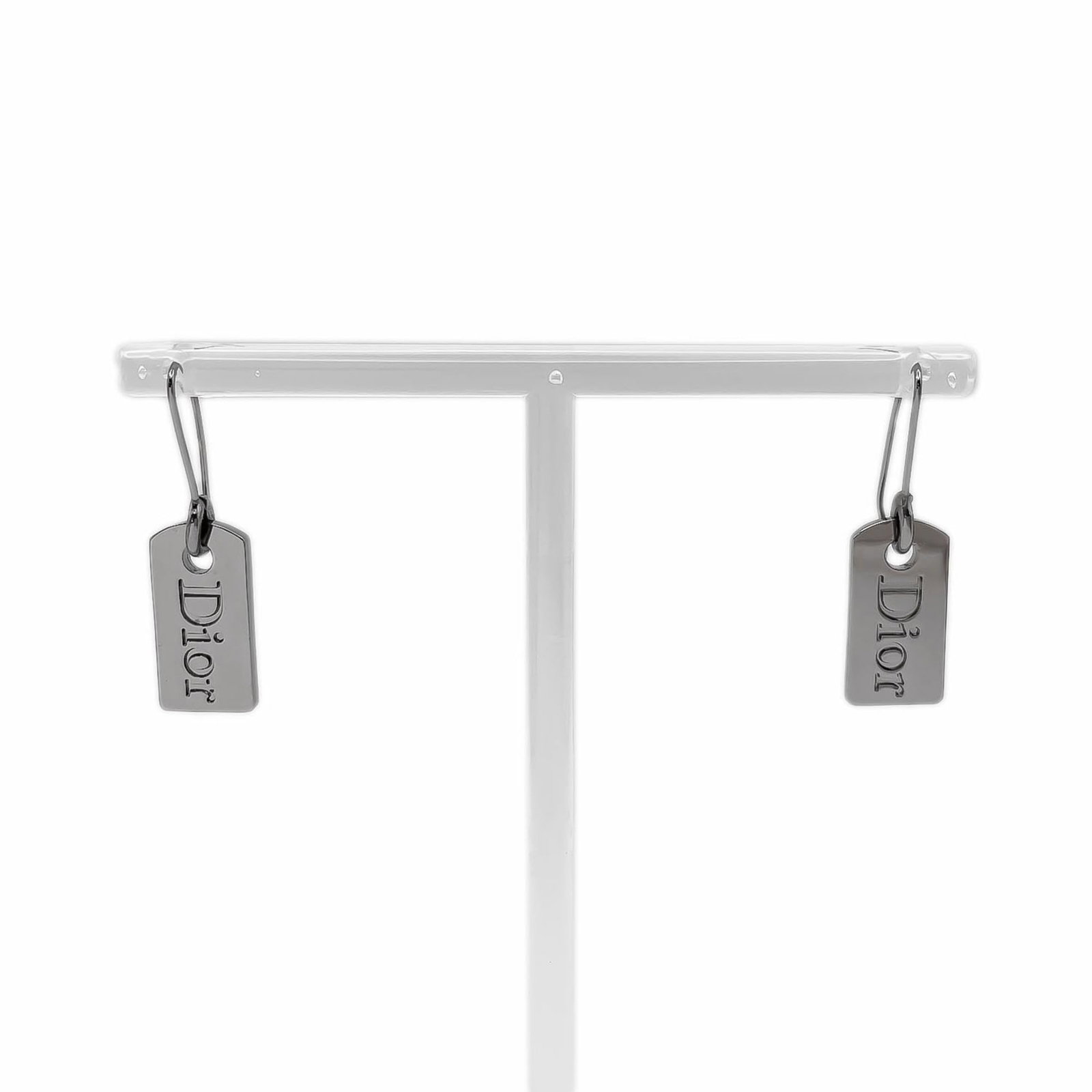 CHRISTIAN DIOR Drop Earrings Metal: CHRISTIAN DIOR Drop Earrings Metal 37.00mm x 10.00mm metal drop earrings from Christian Dior, featuring a gently used condition with minor signs of wear, including small scratches or light marks. The