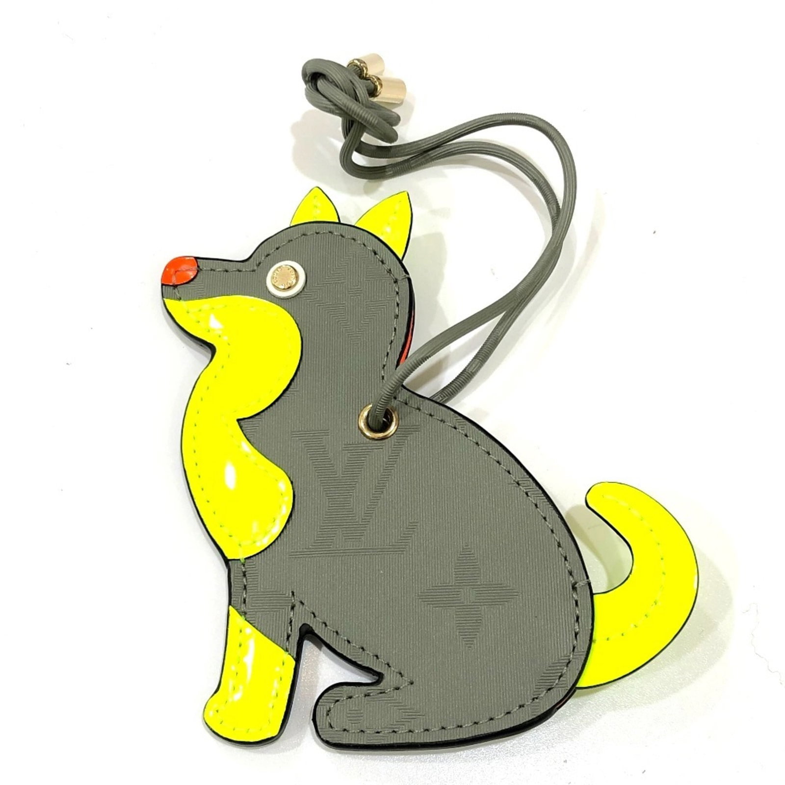 LOUIS VUITTON Handbag Charm Leather: LOUIS VUITTON Handbag Charm Leather Gray Louis Vuitton Monogram Leather Handbag Charm. Made from high-quality leather, this charm features the iconic Louis Vuitton monogram pattern in a subtle gray