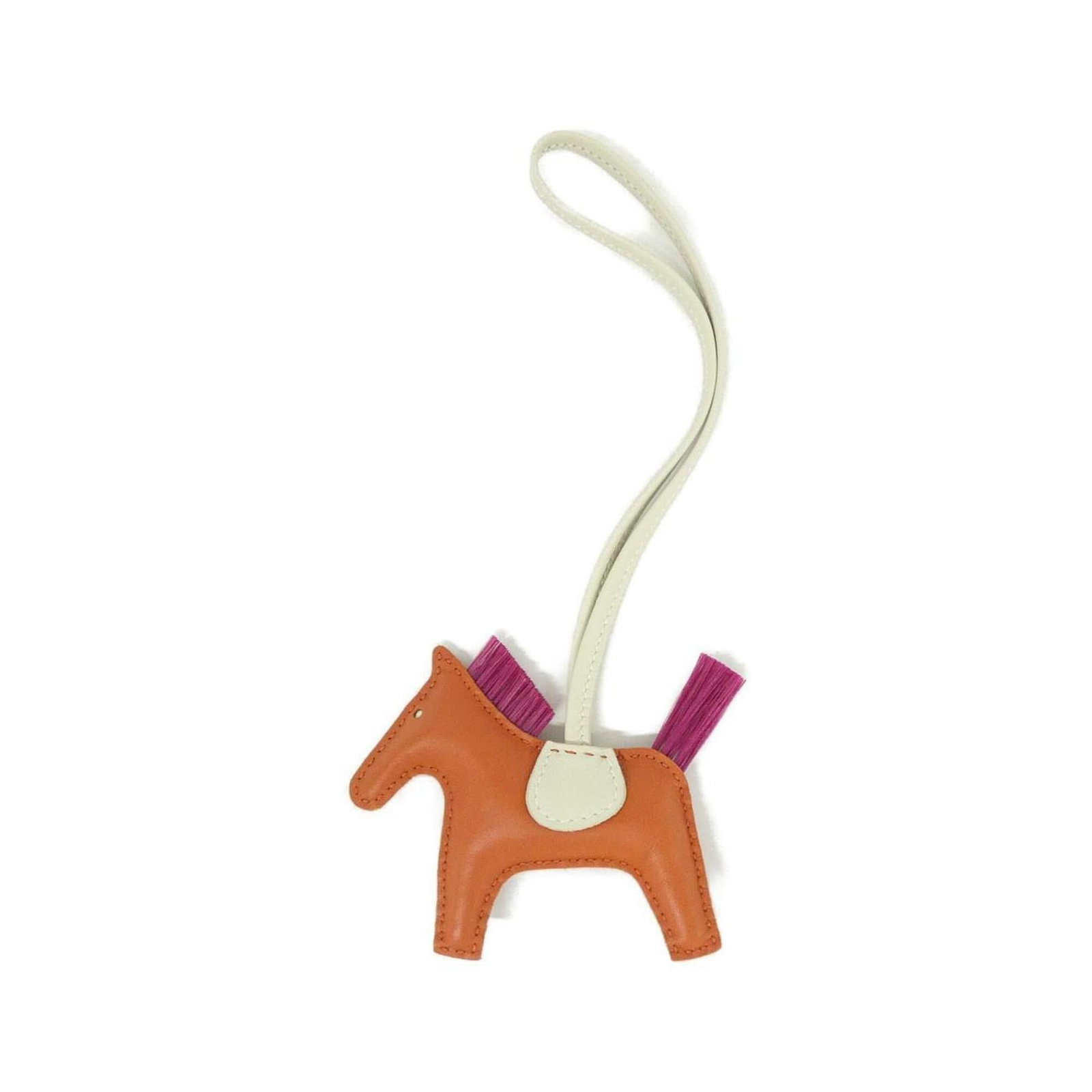 HERMES Handbag Charm Agneau Milo Horse Hair: HERMES Handbag Charm Agneau Milo Horse Hair Agneau Milo Horse Hair Handbag Charm from Hermes - A unique and stylish accessory featuring a vibrant orange color and intricate horse hair design. Made