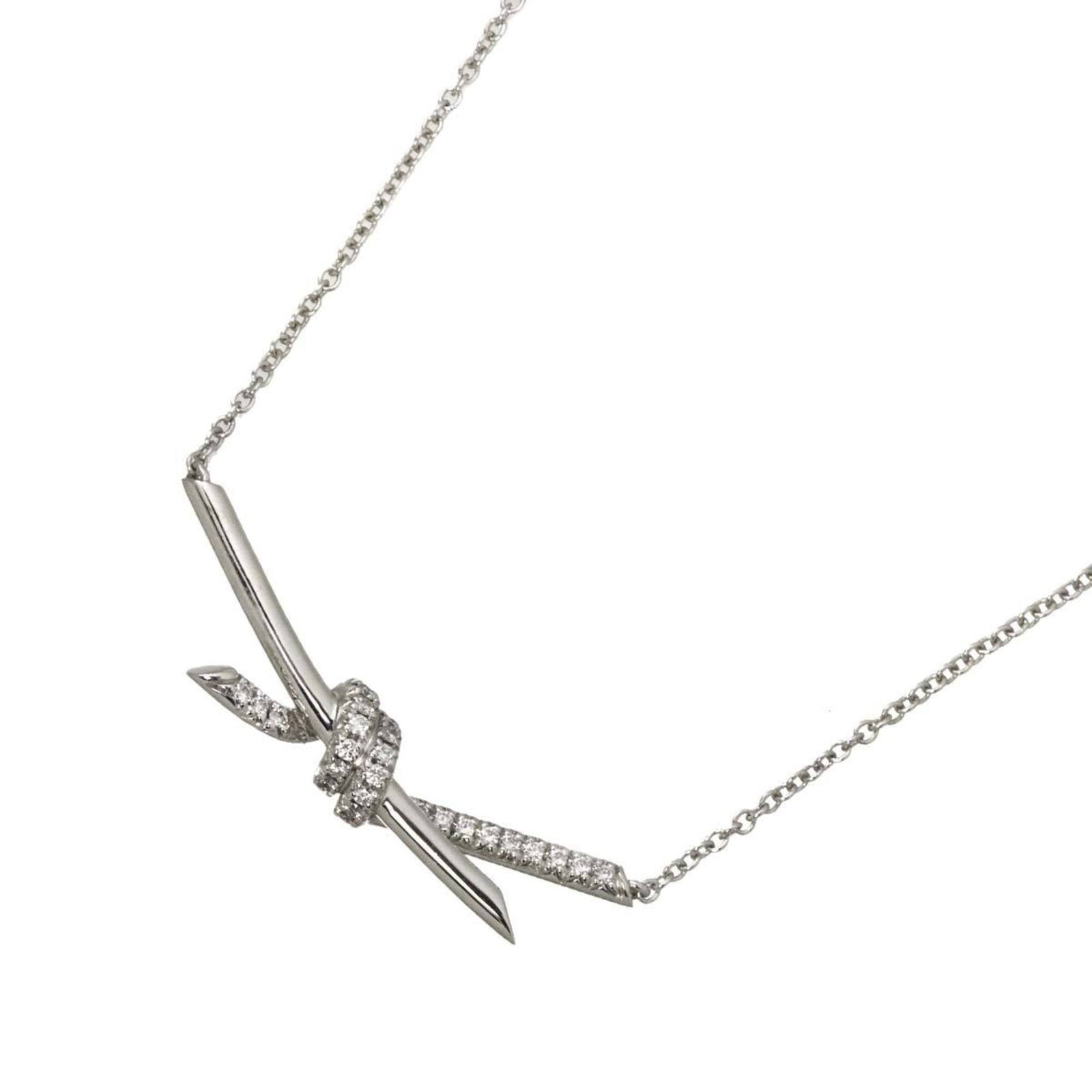 TIFFANY White Gold (18K): TIFFANY White Gold (18K) White gold (18K) necklace from Tiffany, featuring a 7.8mm x 39mm pendant, available in a 43 cm / 16.92'' length. This piece is in like new condition, with only the faintest tr